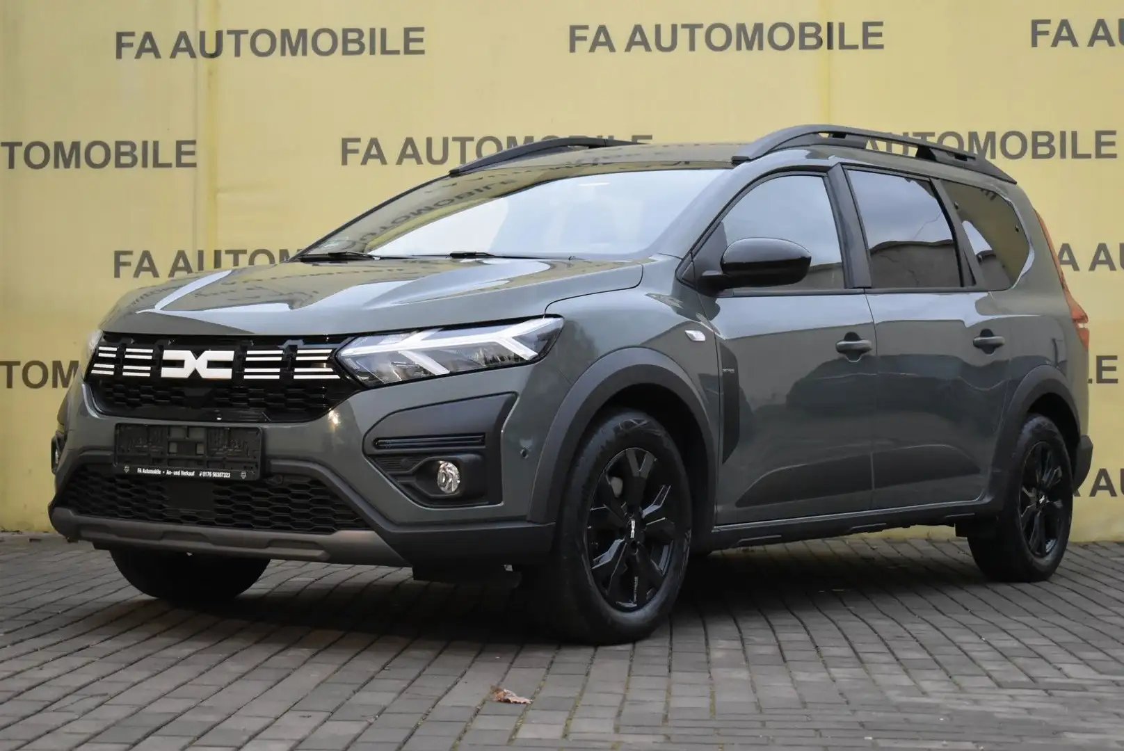 Dacia Jogger Extreme+/7 SITZE/GAS/KEYLESS GO/NAVI/ALU/ Grün - 1
