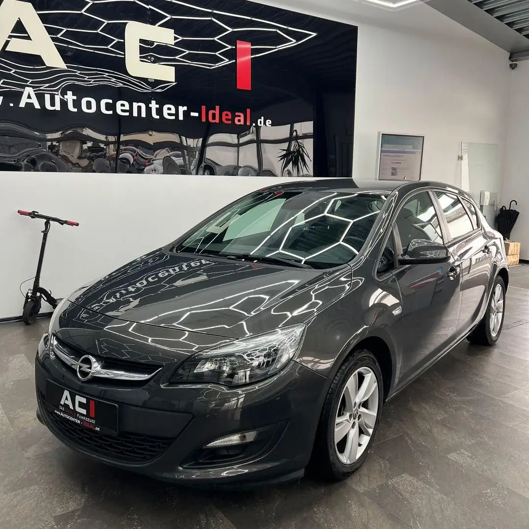 Opel Astra J Lim. 5-trg. Style, Navi, PDC, Temp., SH Grau - 1