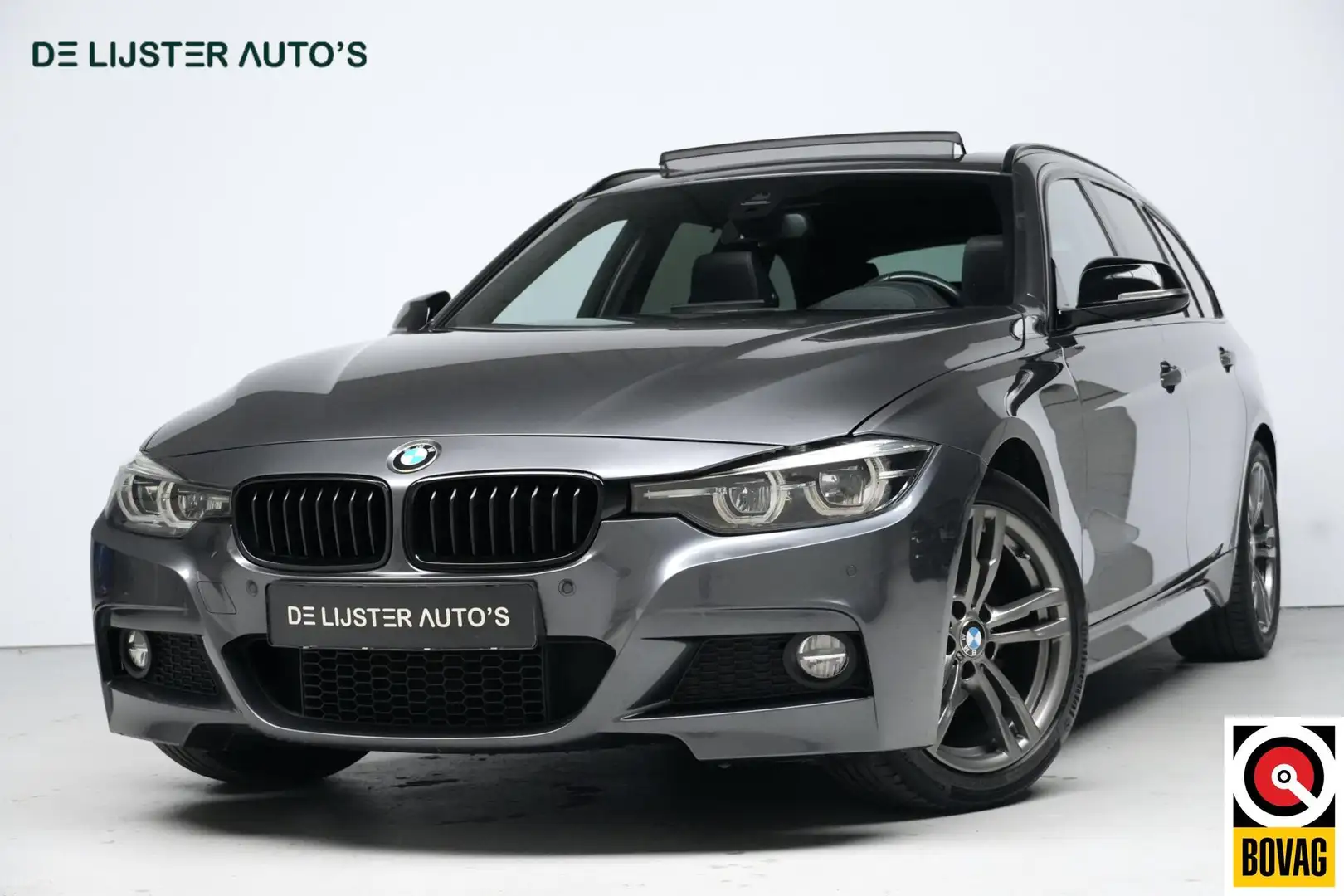 BMW 320 3-serie Touring 320i M Sport High Executive Automa Grijs - 1