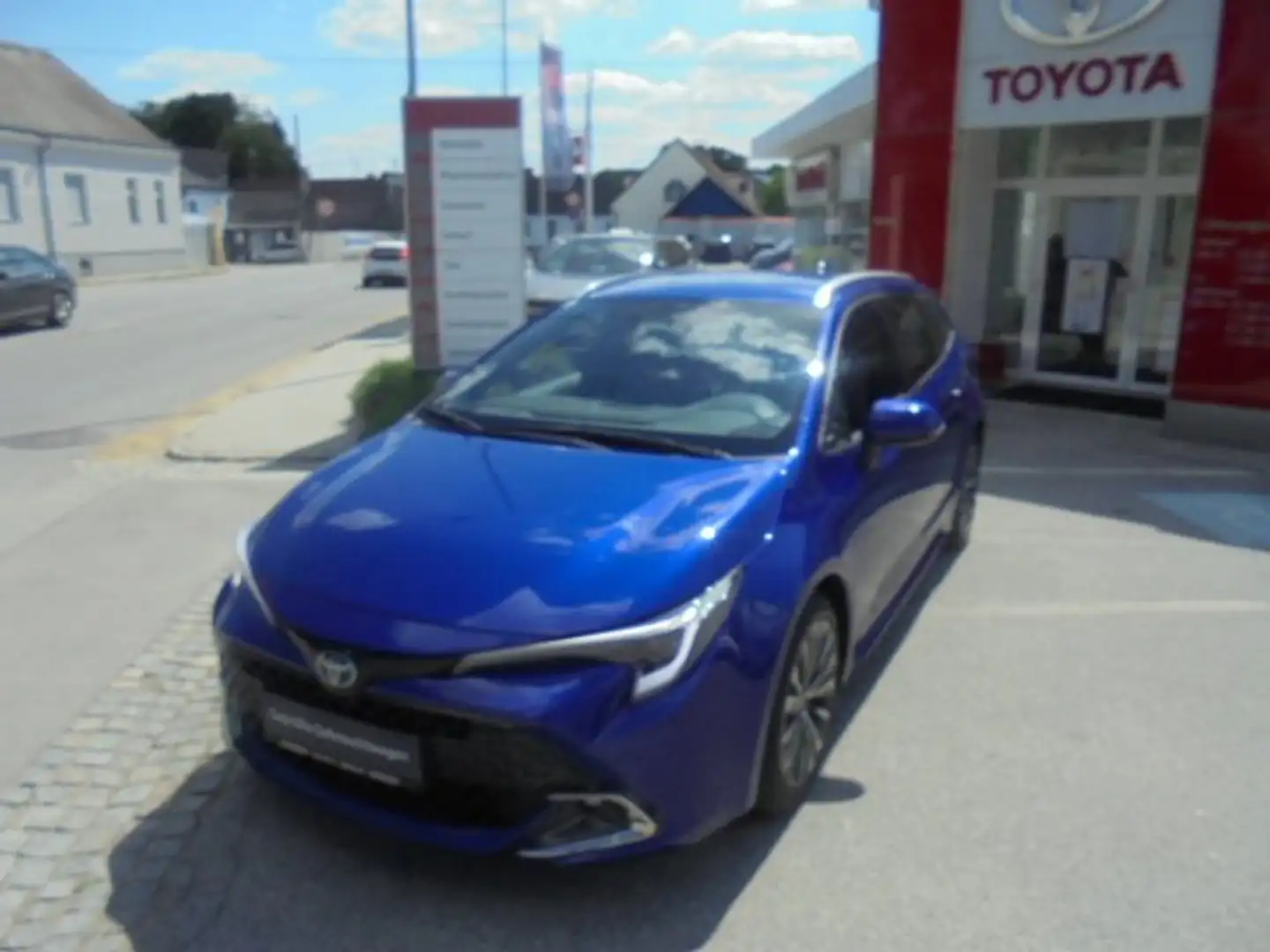 Toyota Corolla 1,8 Hybrid Touring Sports Active Drive Blau - 1