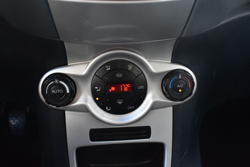 Ford Fiesta 1.25i Titanium / Xenon / Verw Zetels / Topstaat / Garantie — photo 8