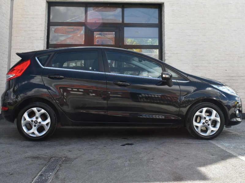 Ford Fiesta 1.25i Titanium / Xenon / Verw Zetels / Topstaat / Garantie — photo 7