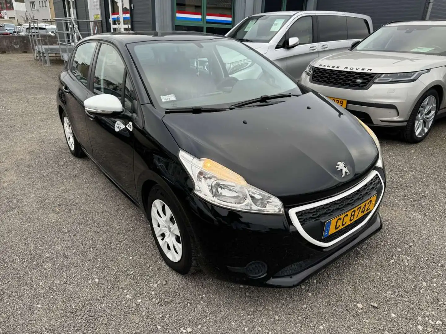 Peugeot 208 1.4 HDI 70 LIKE Noir - 1