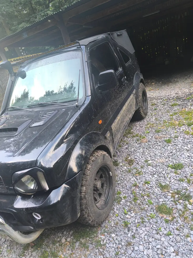 Suzuki Jimny 1.3i JLX Noir - 2