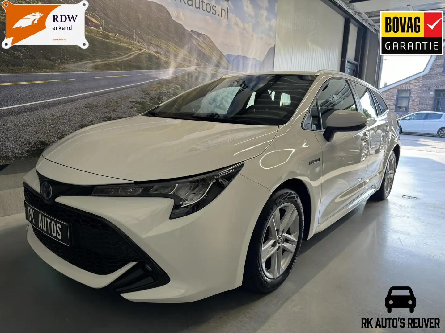 Toyota Corolla Touring Sports 1.8 Hybrid Business Wit - 1