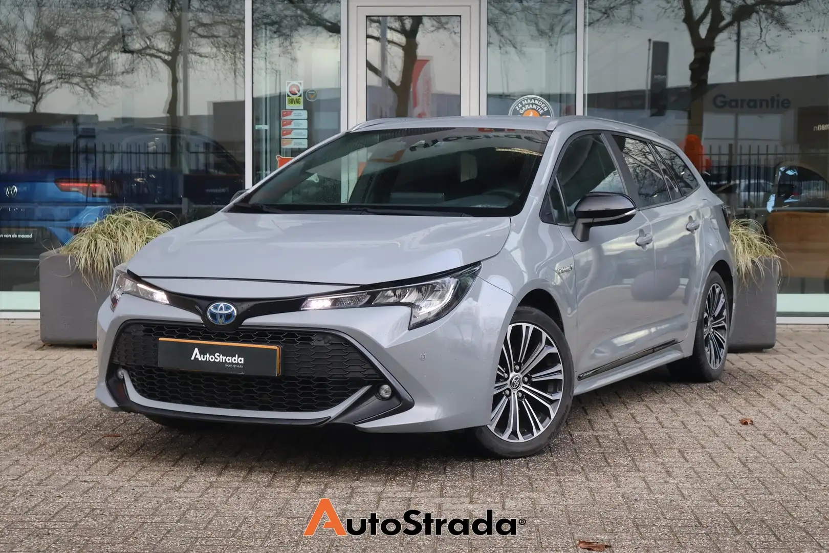 Toyota Corolla Touring Sports 1.8 Hybrid Dynamic 122pk I Navi I C Gris - 1