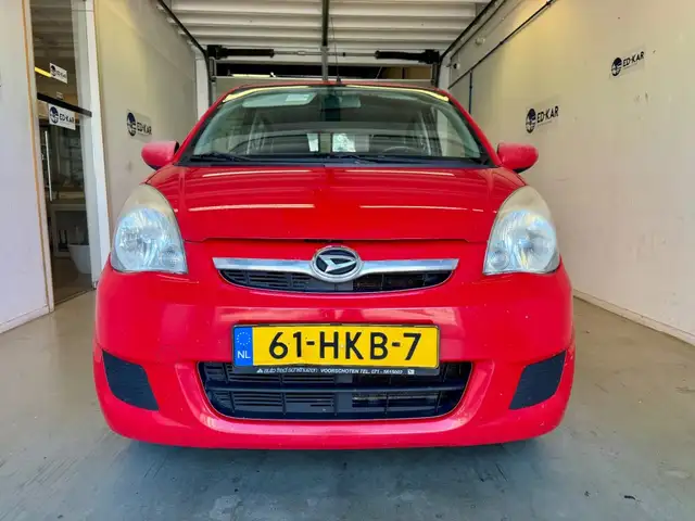 Daihatsu Cuore view 4