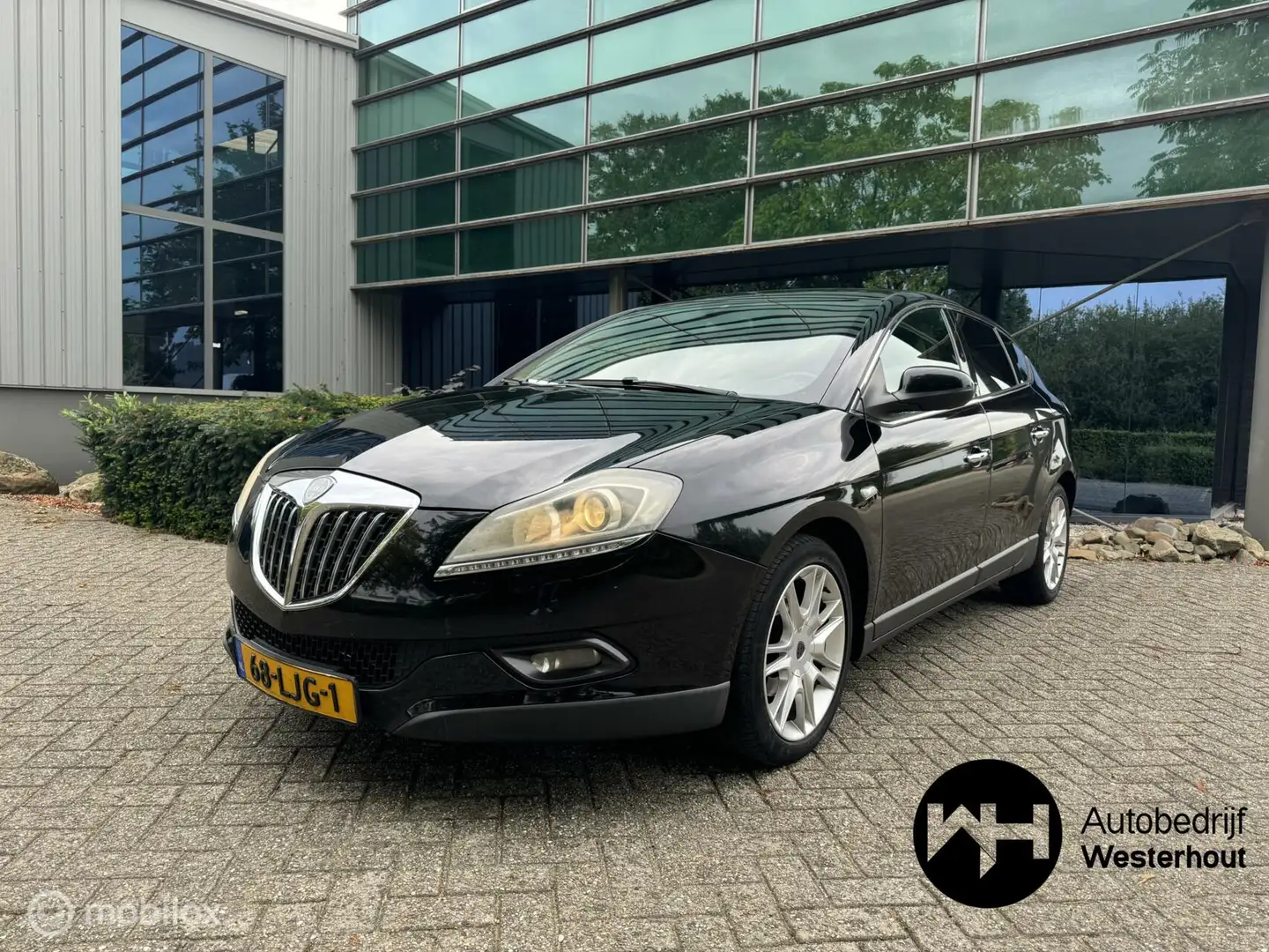 Lancia Delta 1.4-16V Oro Dealer onderhouden Navigatie NWE APK Zwart - 2
