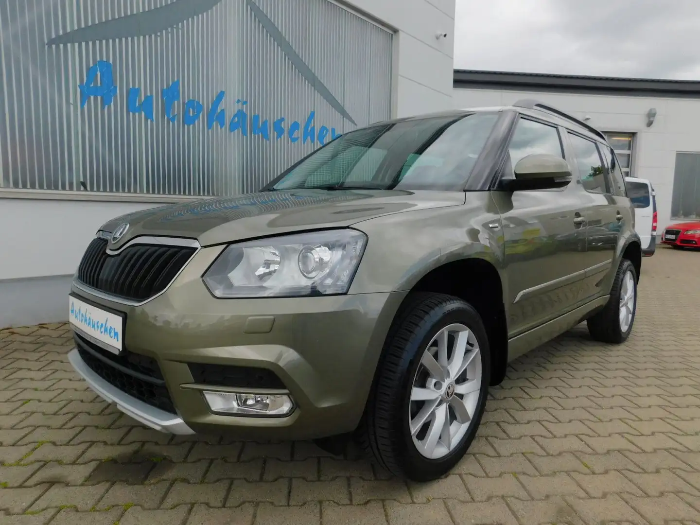 Skoda Yeti 1.4 TSI Joy Automatik/AHZ/Xenon/Navi/PDC Vert - 1