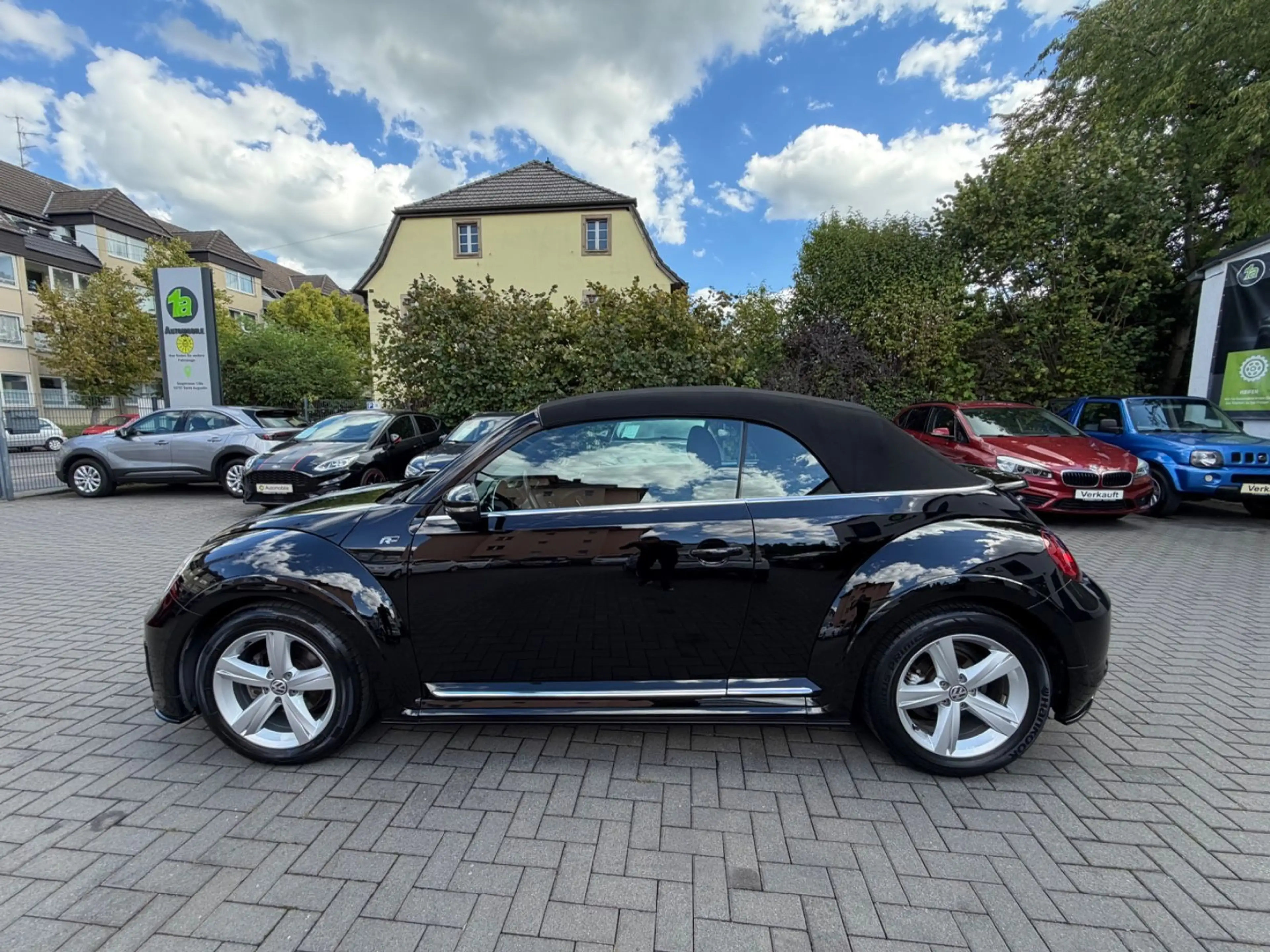 Volkswagen Beetle Cabriolet R-Line*NAVI*SHZ*PDC*1.HAND — photo 9