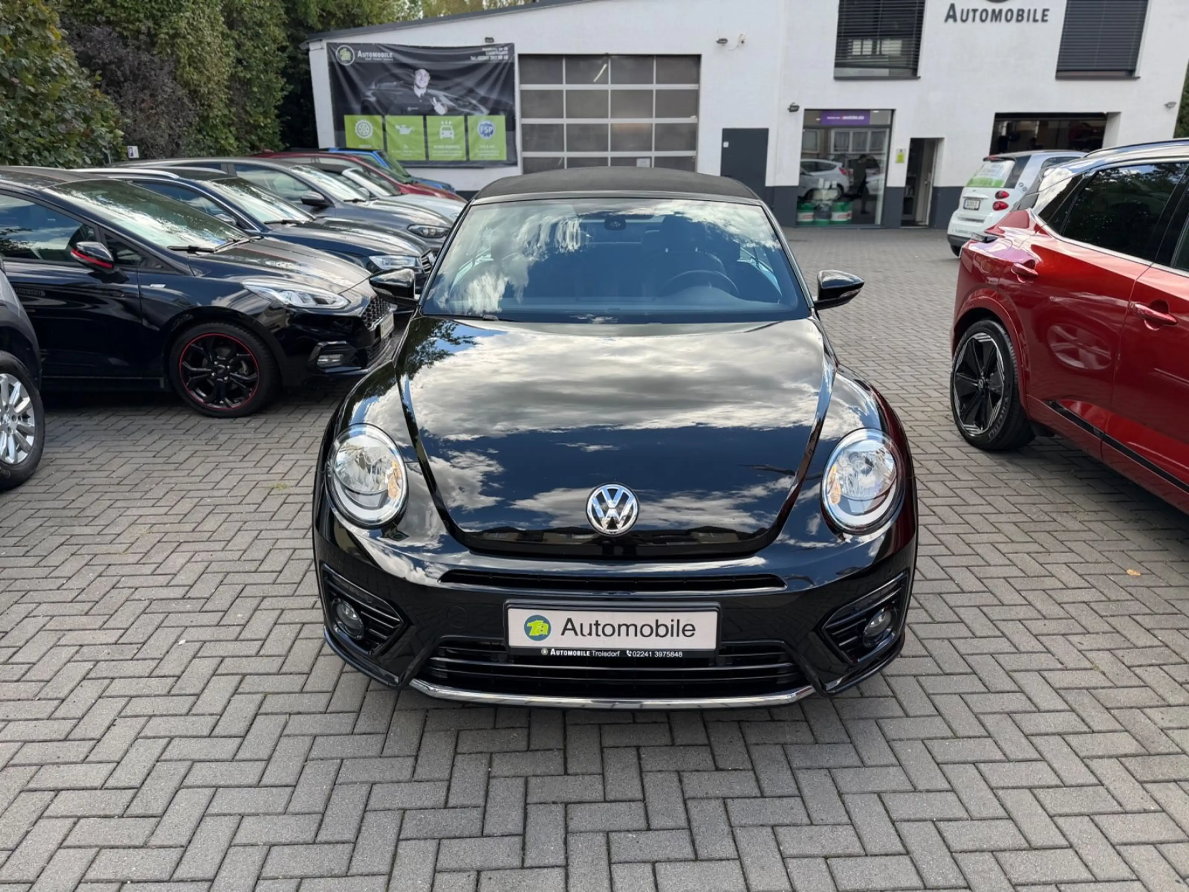 Volkswagen Beetle Cabriolet R-Line*NAVI*SHZ*PDC*1.HAND — photo 3