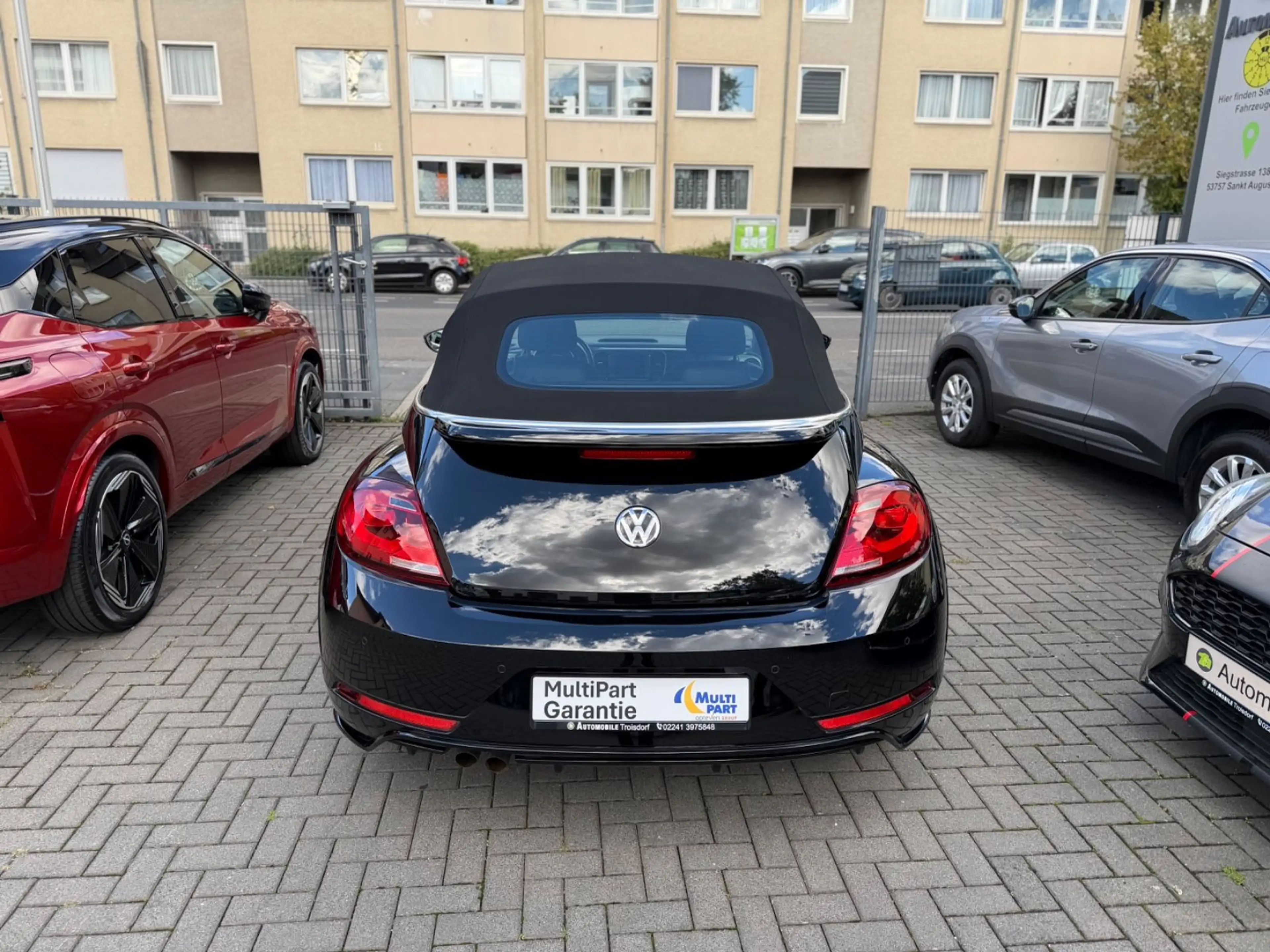 Volkswagen Beetle Cabriolet R-Line*NAVI*SHZ*PDC*1.HAND — photo 6