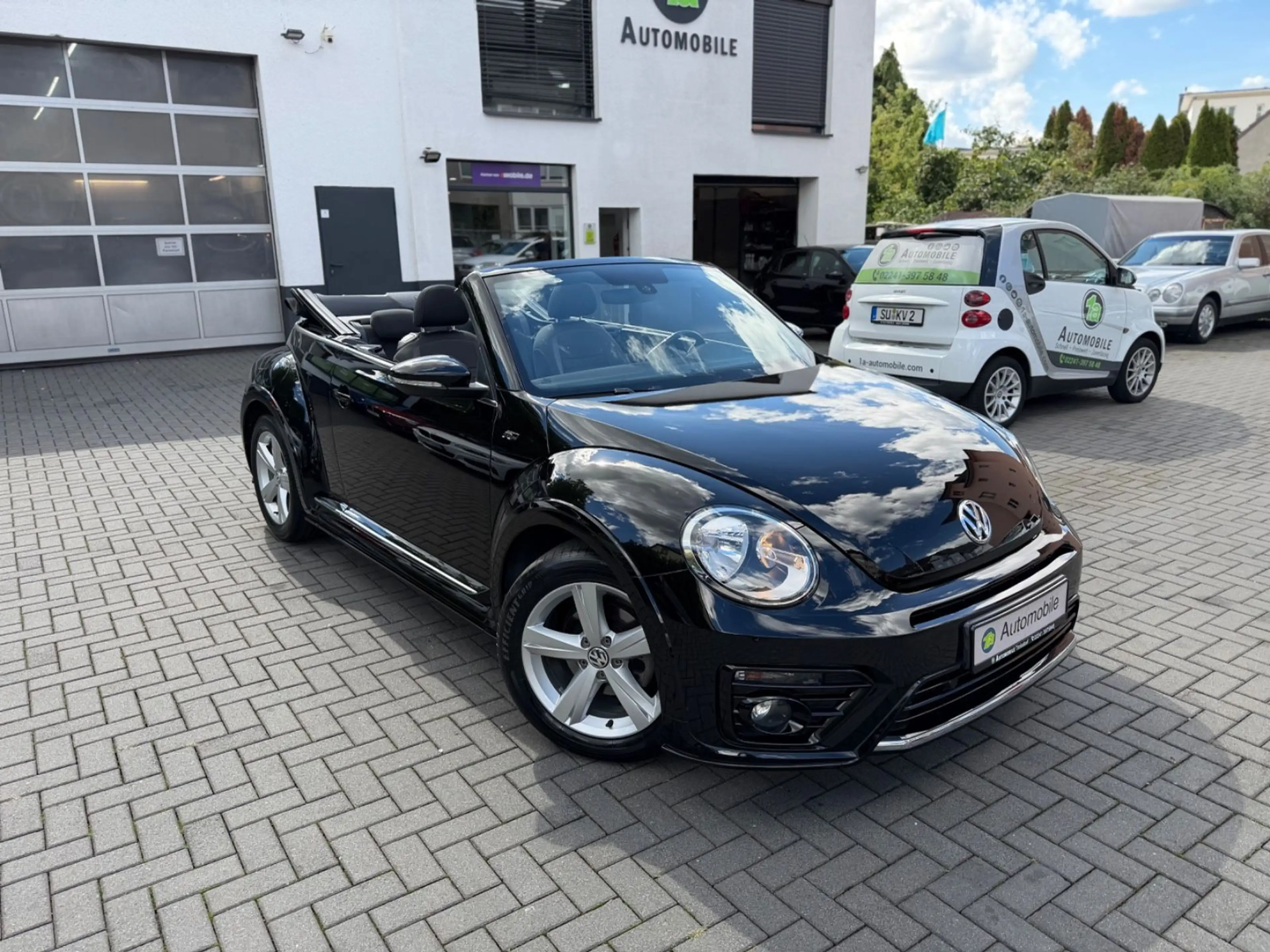 Volkswagen Beetle Cabriolet R-Line*NAVI*SHZ*PDC*1.HAND — photo 2