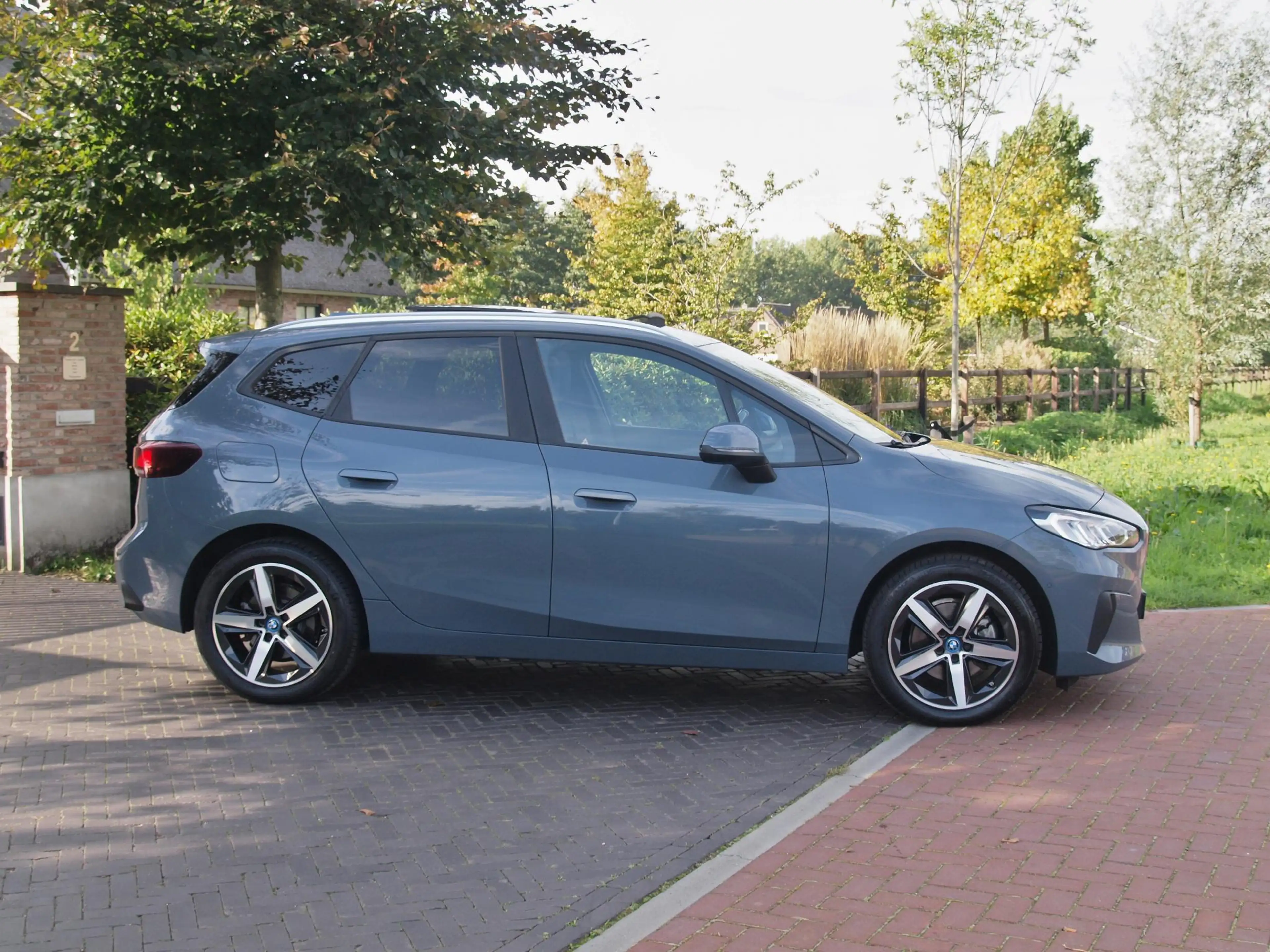 BMW 225 2-serie Active Tourer 225e xDrive | Panoramadak | — photo 11