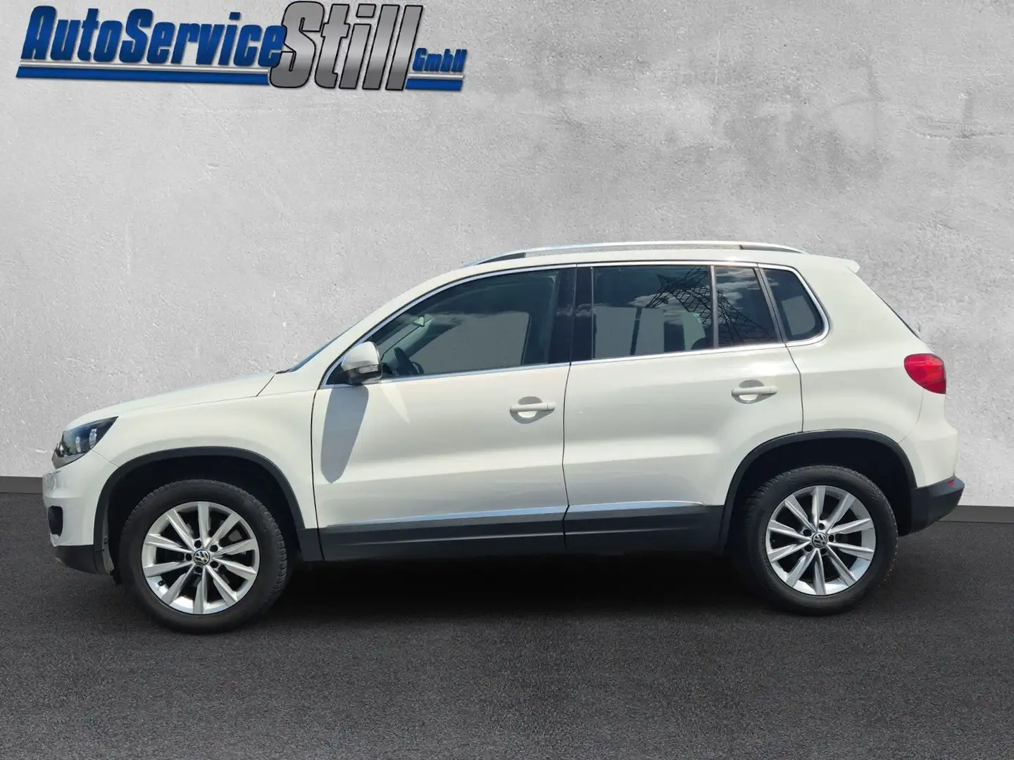 Volkswagen Tiguan Sport & Style / 4Motion / Allwetter / 2 Hand Wit - 2