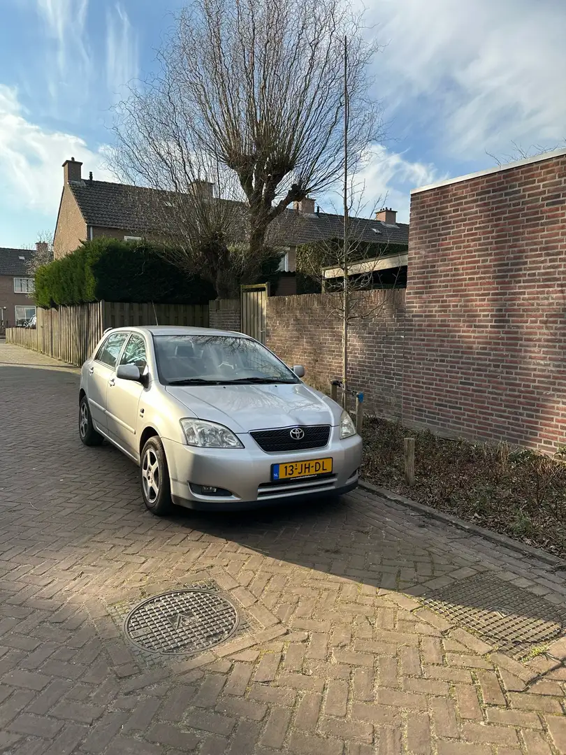 Toyota Corolla 1.6 VVT-i Linea Sol Grijs - 1