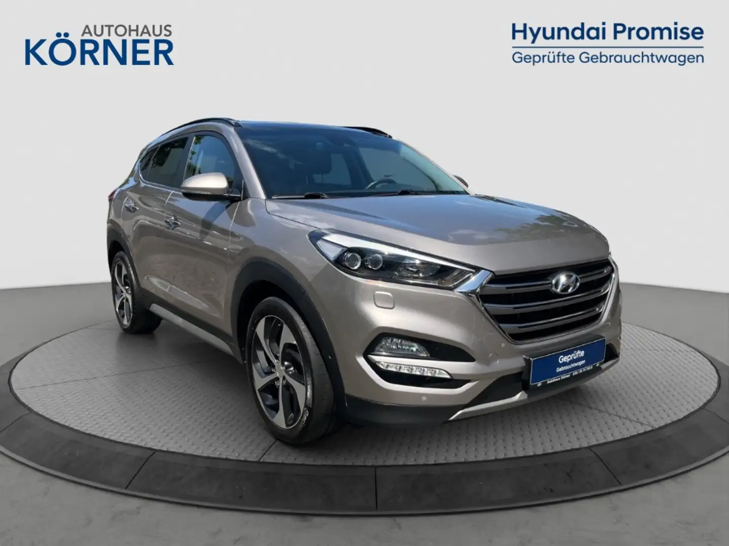 Hyundai TUCSON 2.0 CRDi 4WD Automatik *PANO*NAVI*LEDER*AHK*CAM* Beige - 1