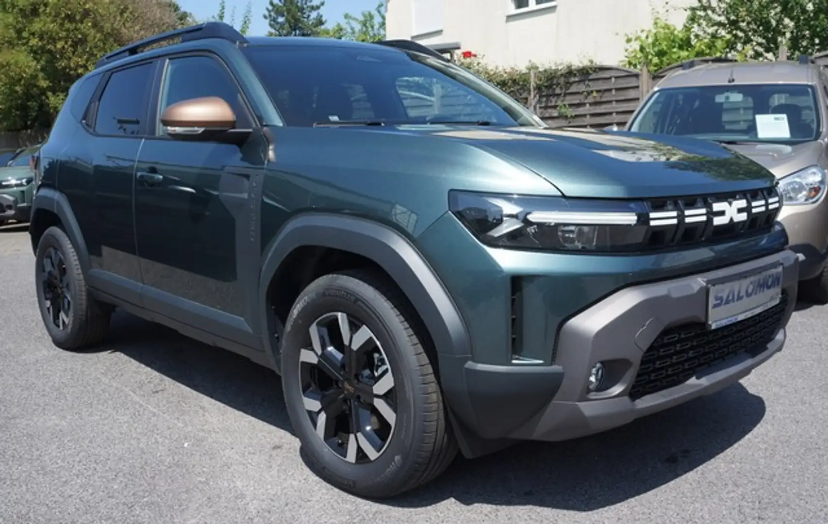 Dacia Duster III 140 AUTOM HYBR Extreme+ Grau - 1