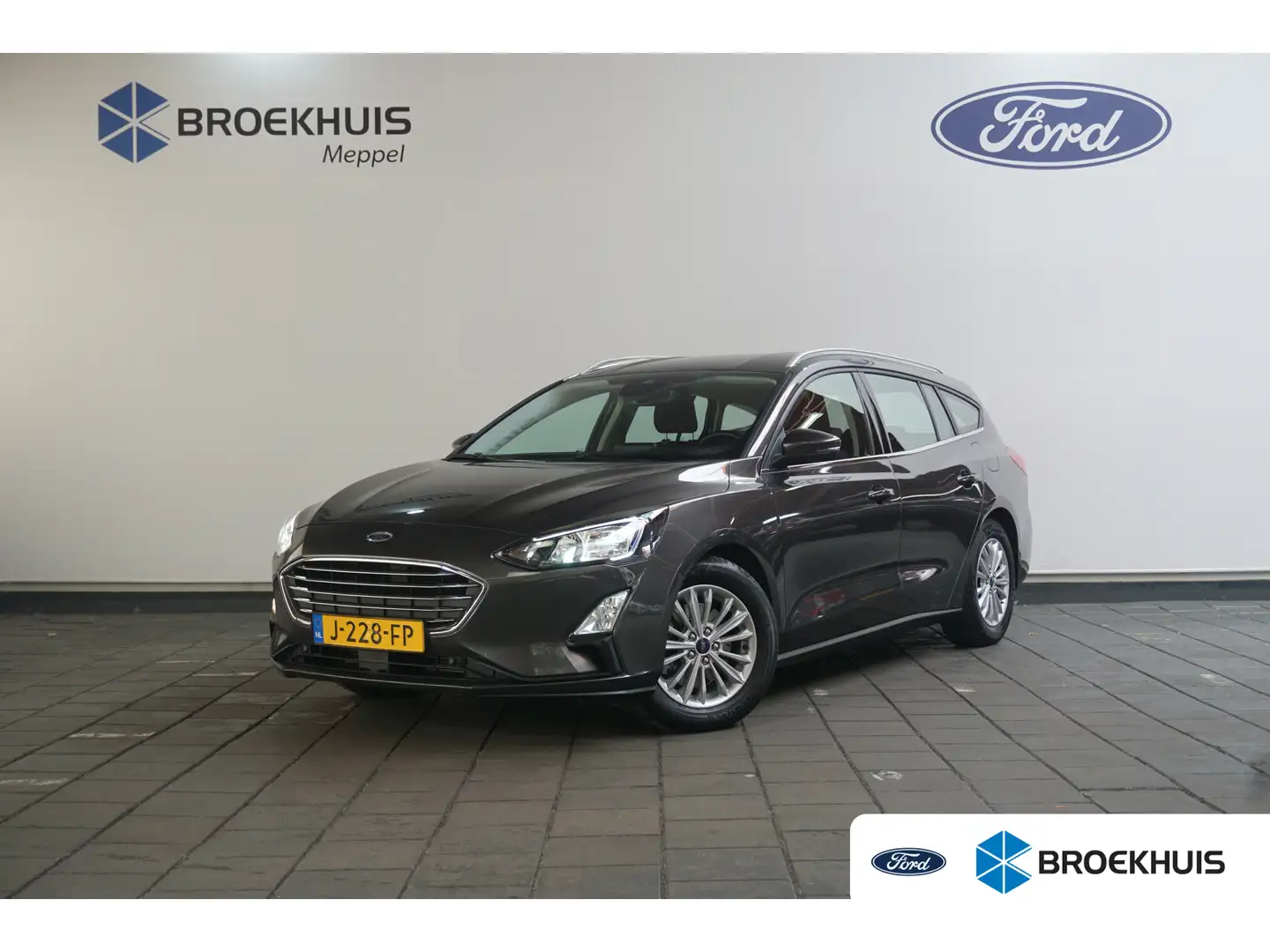 Ford Focus Wagon 1.0 EcoBoost Titanium Business | Adaptive Cr Grijs - 1