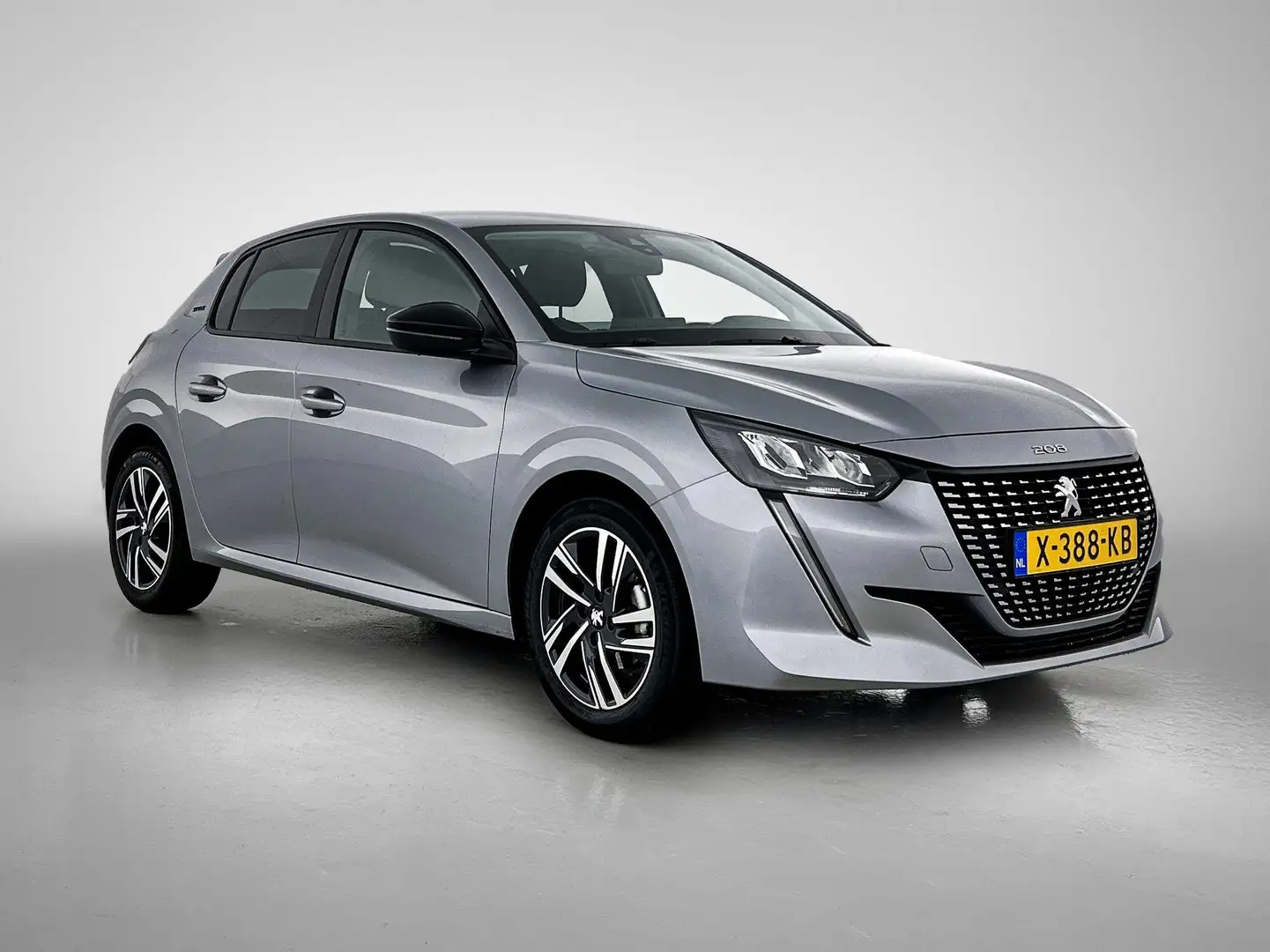 Peugeot 208 Style 75pk | Navigatie | Parkeersensoren Achter | Grijs - 2