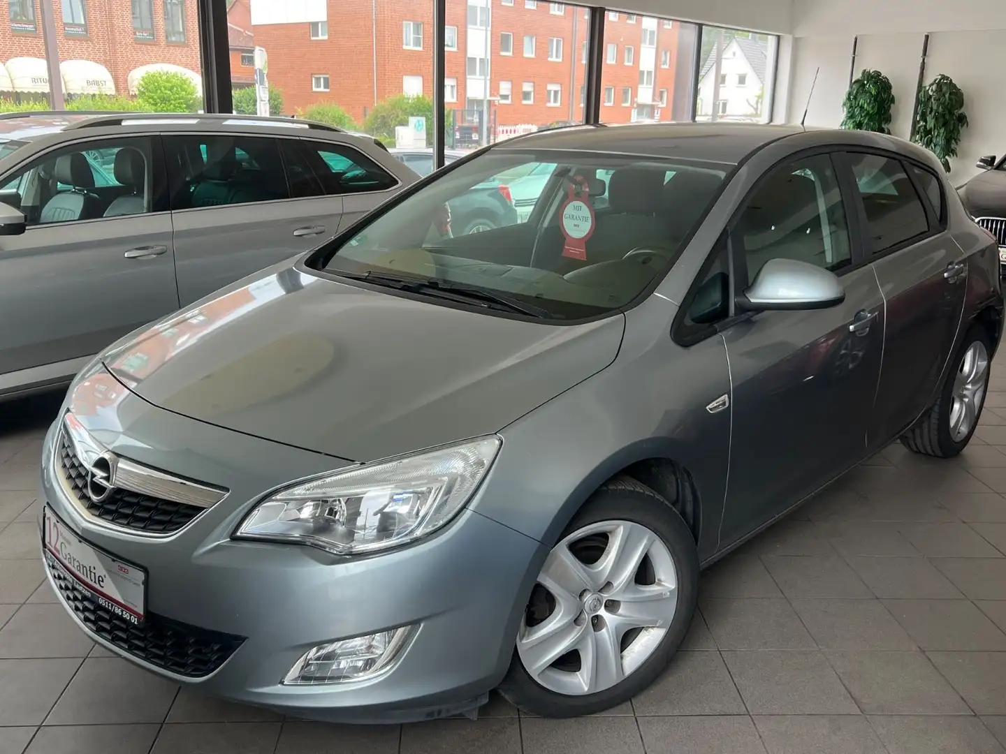 Opel Astra 1.6 Design Edition ~MultiLenkrad~SHZ~PDC~ Silber - 1