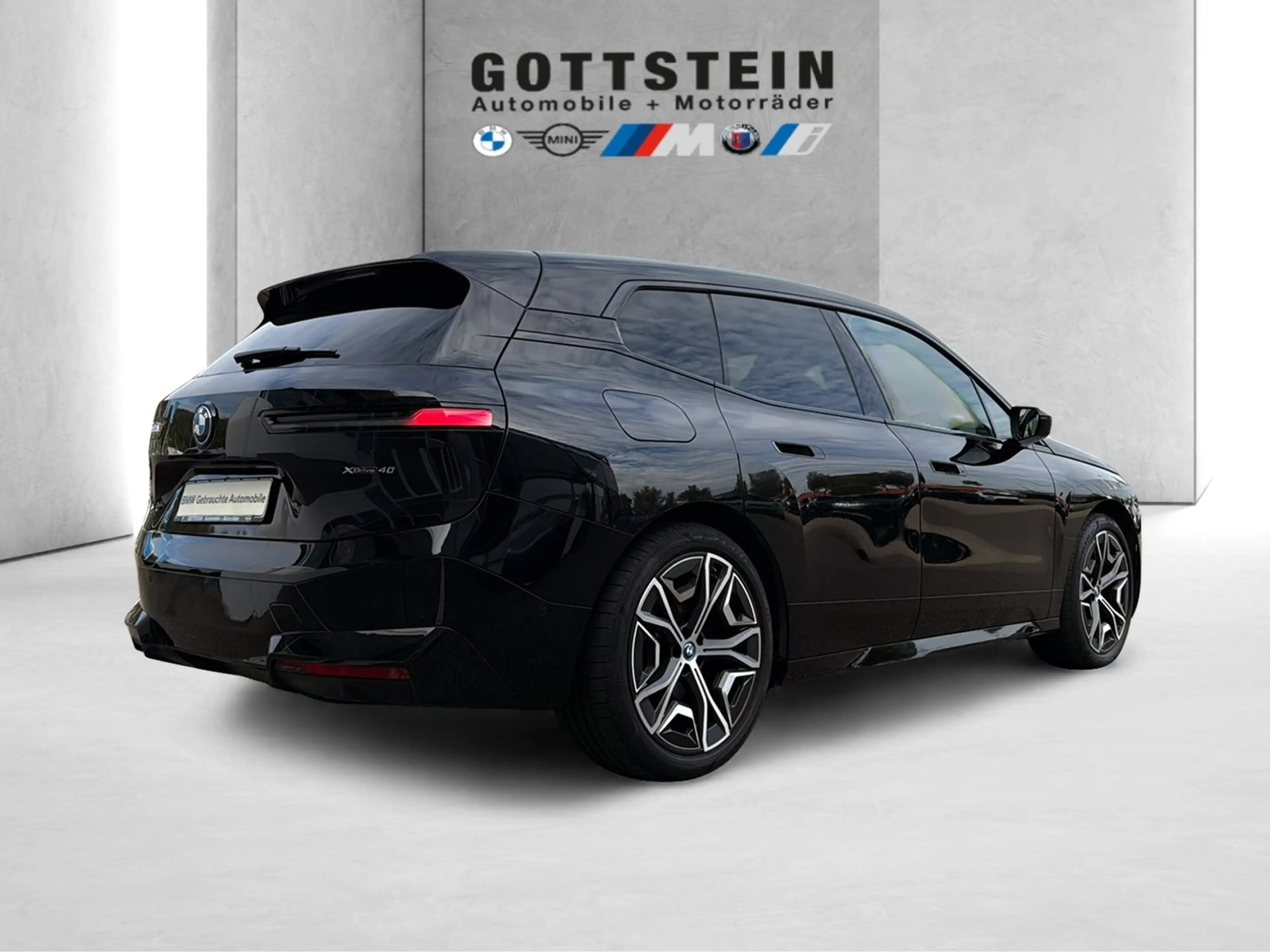 BMW iX xDrive40 Sportpaket — photo 11