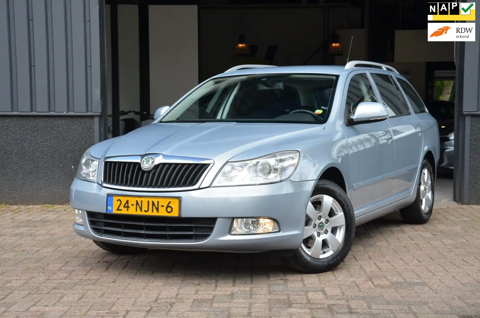 Skoda Octavia Combi 1.2 TSI Elegance AUT|Cruise C.|Xenon|Stoelve Bleu - 1