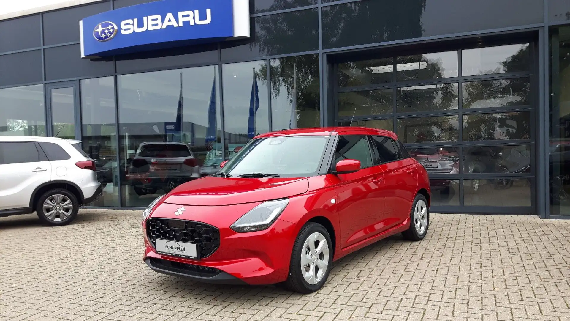 Suzuki Swift 1.2 Dualjet Hybrid 61 kW Comfort Rouge - 1