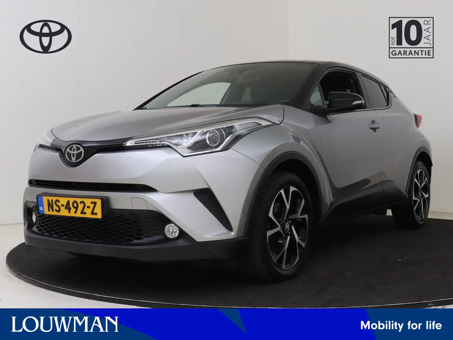 Toyota C-HR 1.2 Bi-Tone | Navigatie | Trekhaak |  Stoelverwarm Grijs - 1