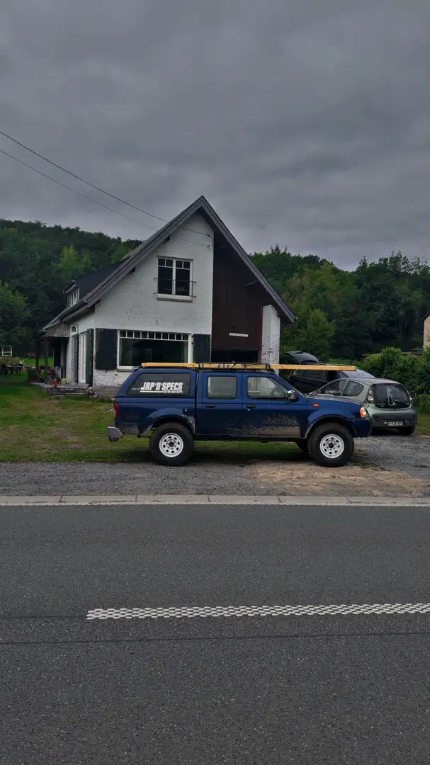 Nissan Navara Full option Blauw - 1