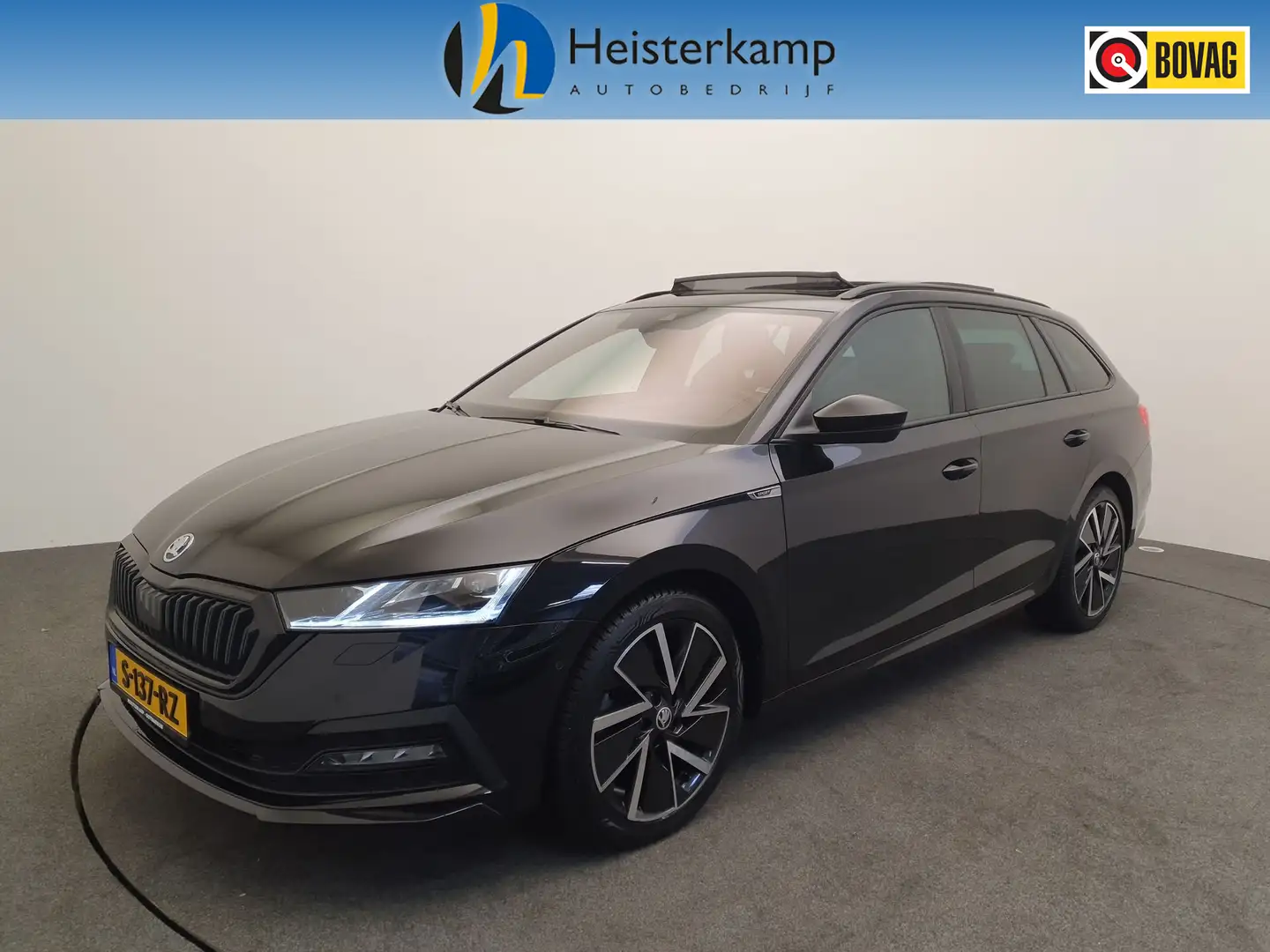 Skoda Octavia Combi 1.5 e-TSI 150pk DSG/AUT Sportline Trekhaak, Negro - 1