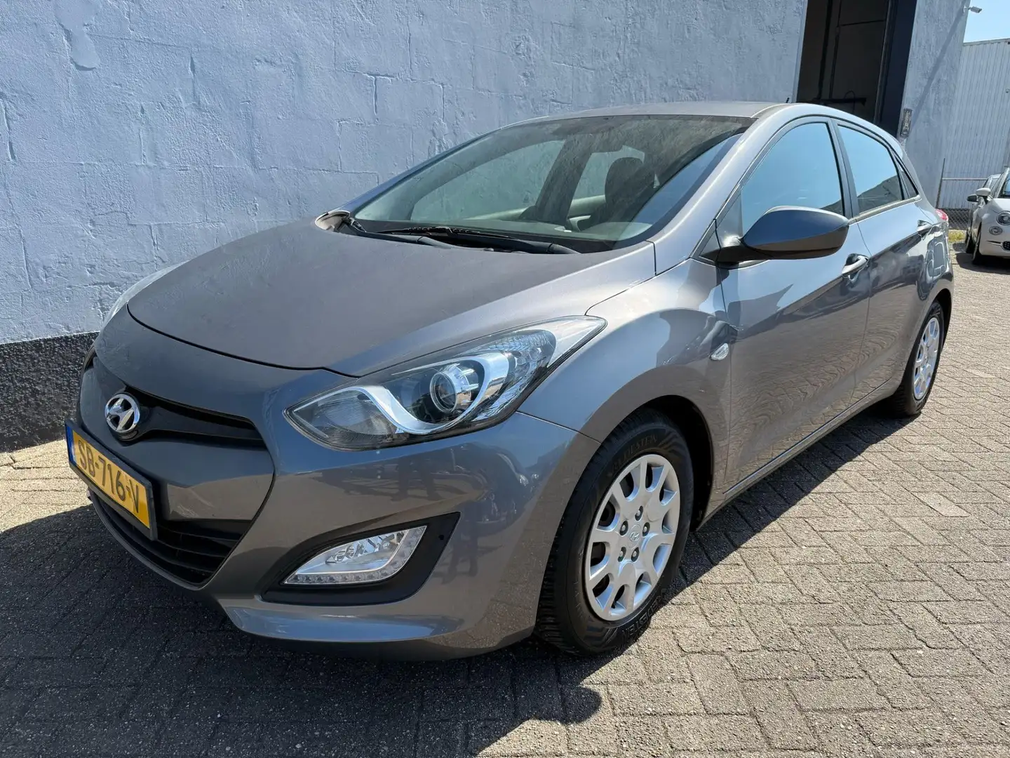 Hyundai i30 1.4 i-Drive - Cruise Control - Stoelverwarming Grijs - 1