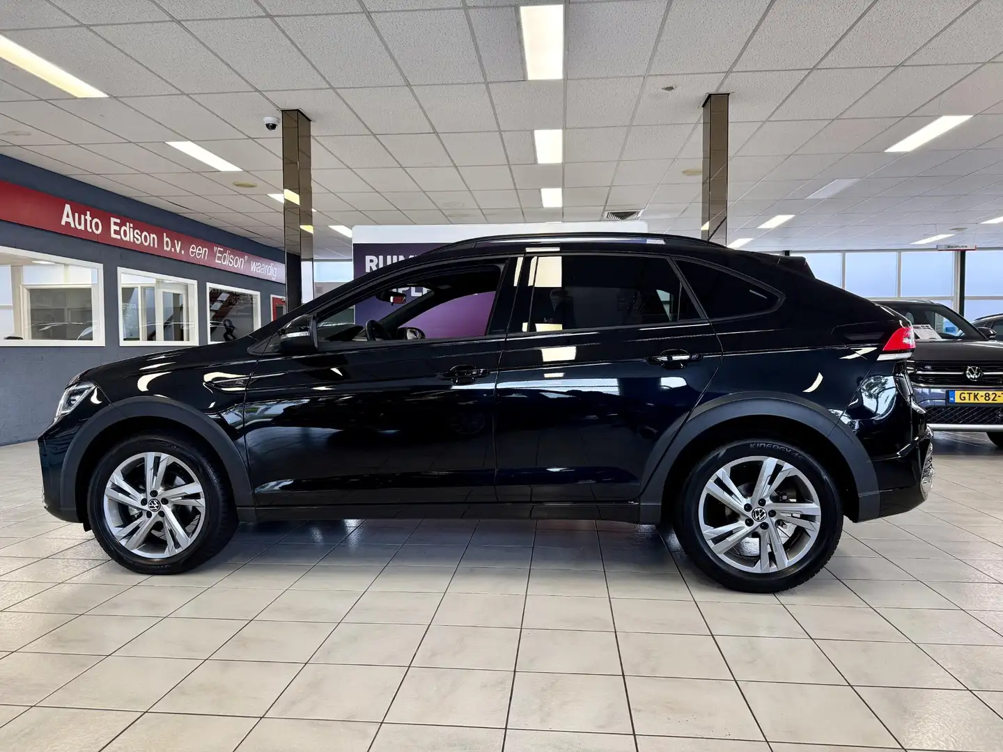 Volkswagen Taigo 1.5 TSI R-Line DSG *IQ-BUSS-PACK*CAM*APP*LM17* Zwart - 2