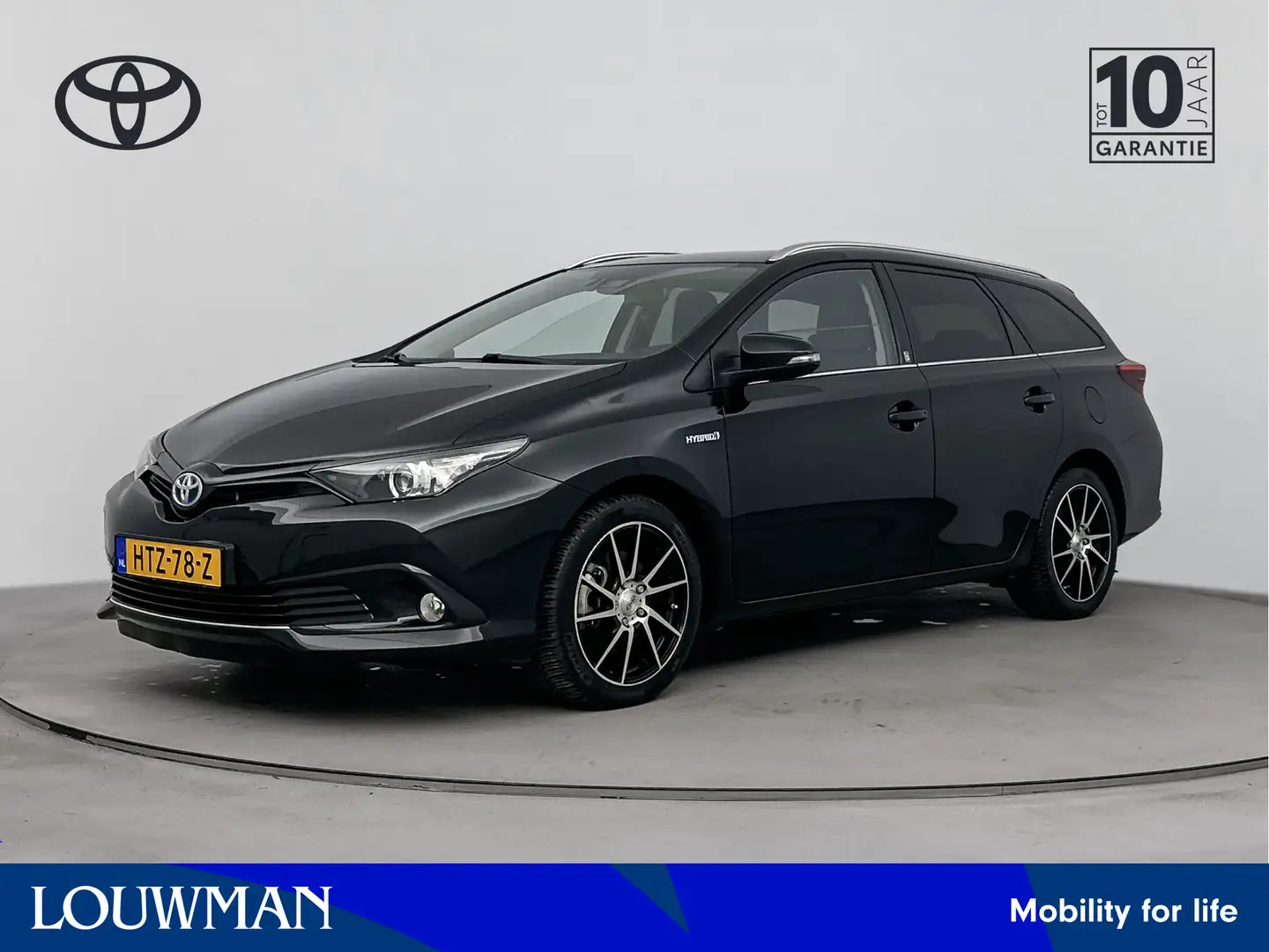 Toyota Auris Touring Sports 1.8 Hybrid Lease Limited | Parkeerc Schwarz - 1