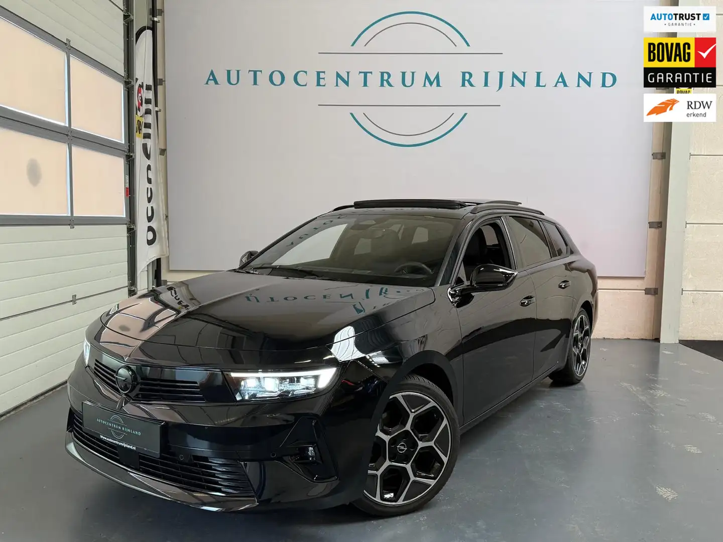 Opel Astra SPORTS TOURER 1.2 Turbo Ultimate 1 JAAR BOVAG GARA Zwart - 1