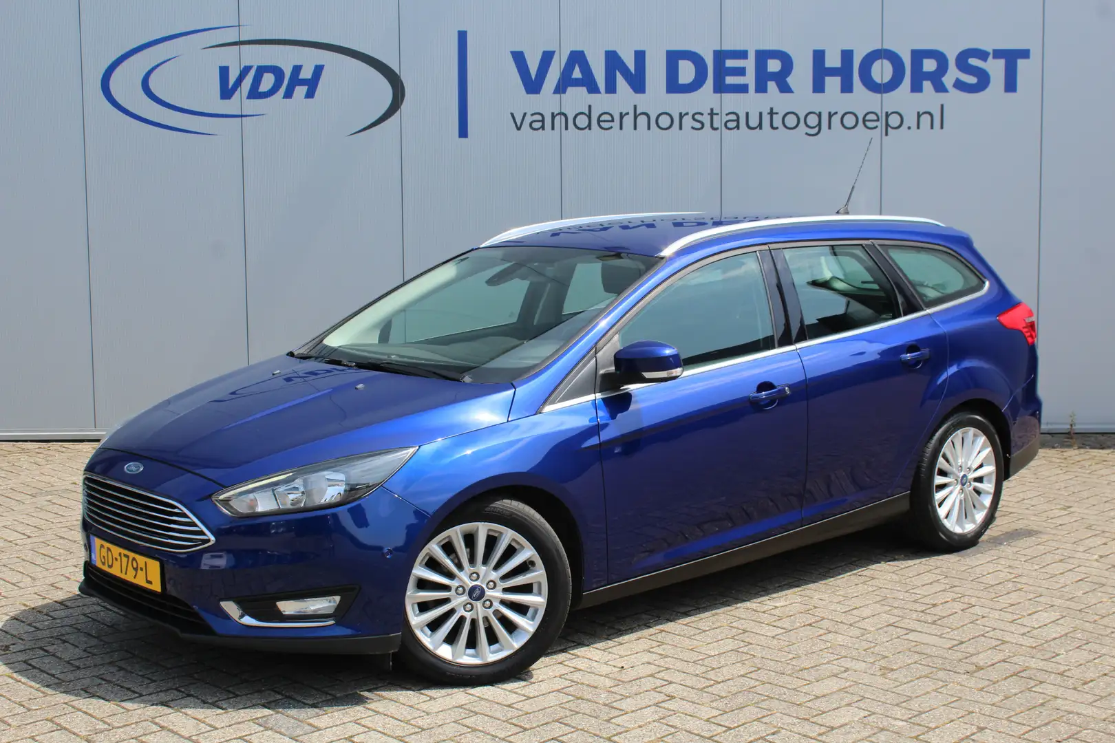 Ford Focus Wagon 1.0 125 pk EcoBoost Titanium First Edition C Blauw - 1