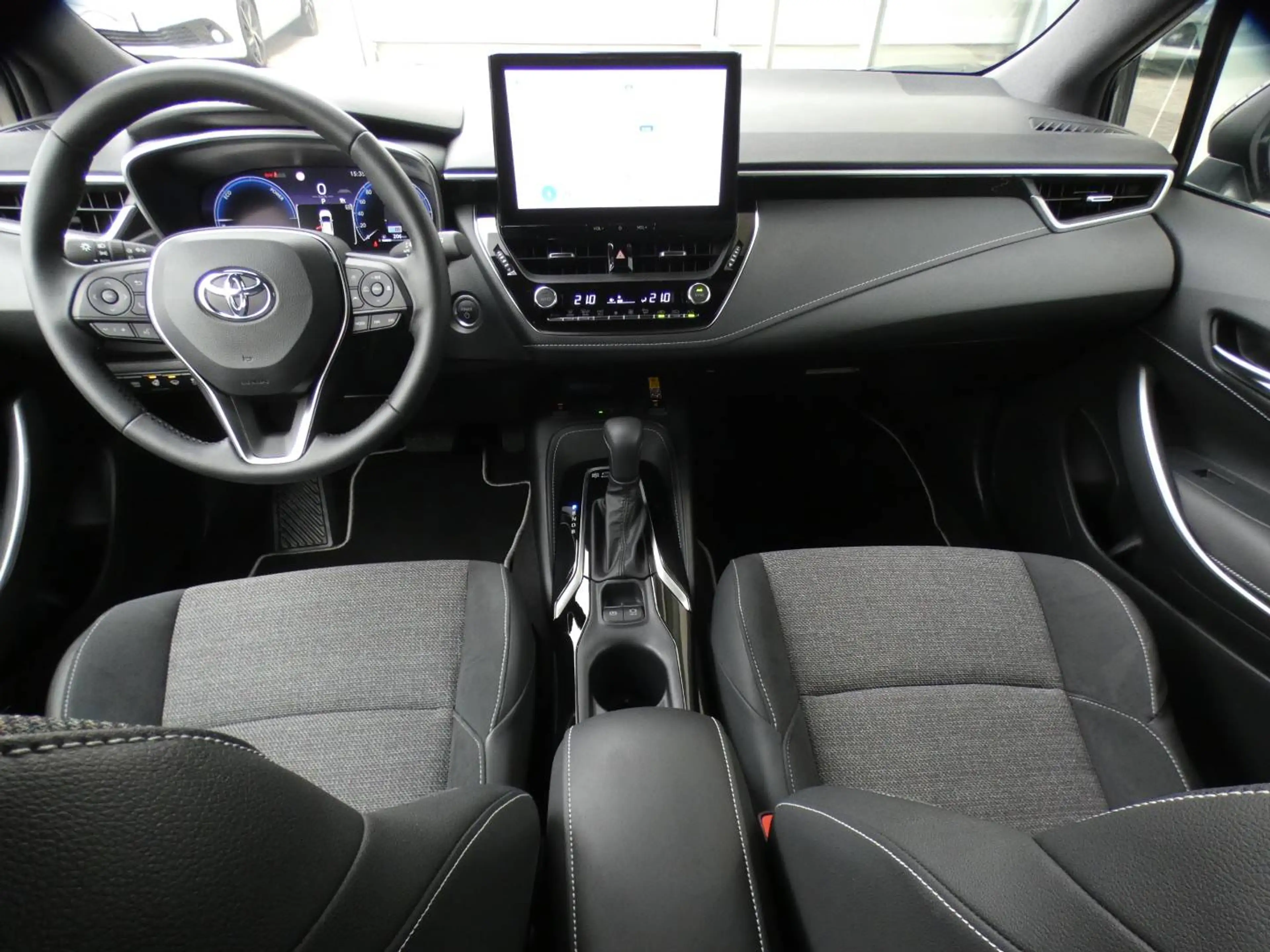 Toyota Corolla HB 1.8 Hybrid STYLE+TECH PACK 140pk +Dodehoek +Stuurwielverwarming +Zetelverwarming +Half leder +GPS — photo 15