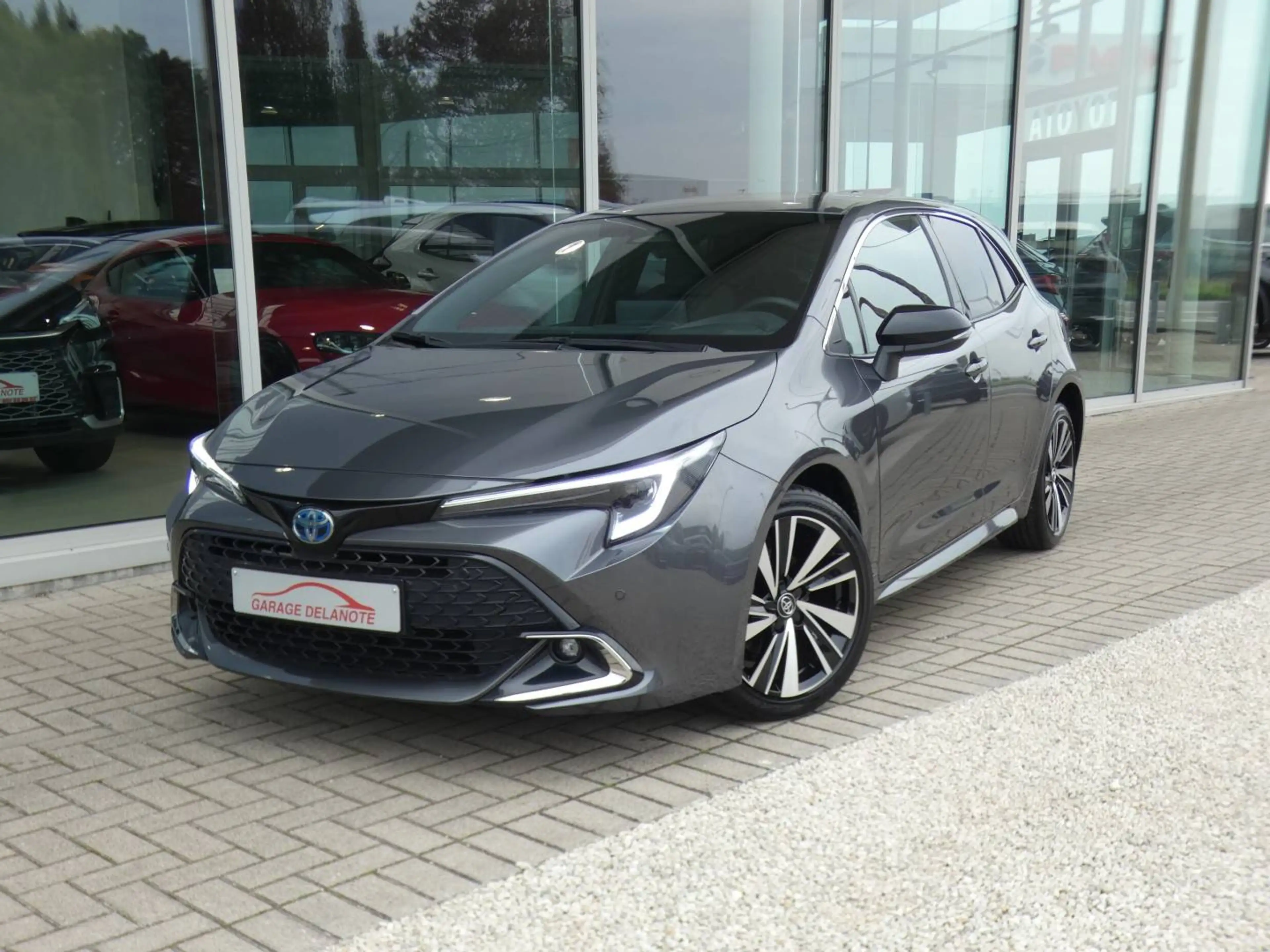 Toyota Corolla HB 1.8 Hybrid STYLE+TECH PACK 140pk +Dodehoek +Stuurwielverwarming +Zetelverwarming +Half leder +GPS — photo 2