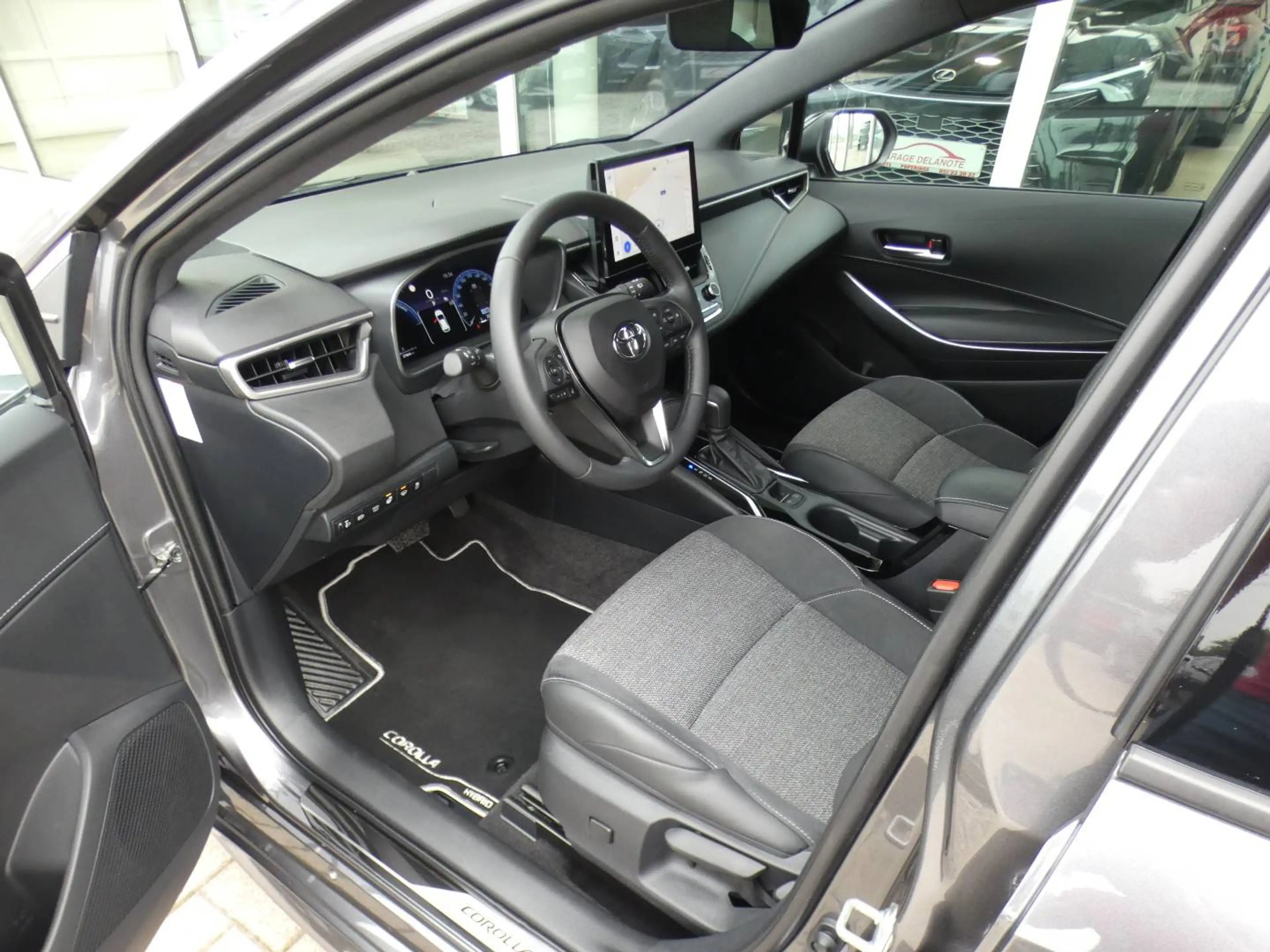 Toyota Corolla HB 1.8 Hybrid STYLE+TECH PACK 140pk +Dodehoek +Stuurwielverwarming +Zetelverwarming +Half leder +GPS — photo 10