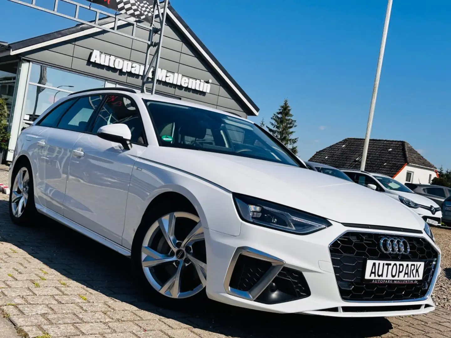 Audi A4 Avant 40 TDI S line *AHK*LED*LEDER*NAVI* Wit - 1