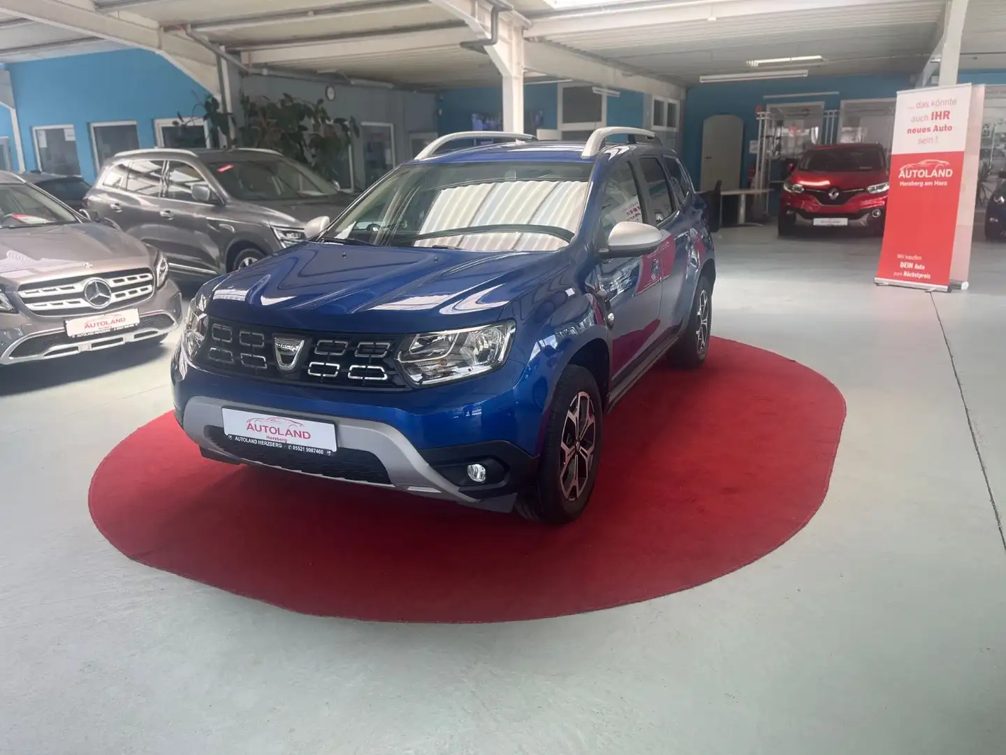 Dacia Duster II Celebration 4WD AHK NAVI 1HD TEMP SHZ Blau - 1