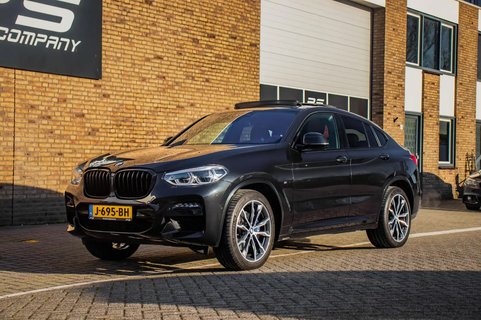 BMW X4 xDrive20i High Executive Edition/NAP/Leder/Pano/HU Noir - 2