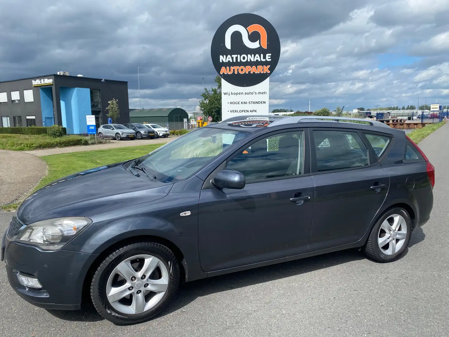 Kia Ceed / cee'd Sporty Wagon 2012 * 1.4 CVVT X-ecutive * LMV * AIR Grijs - 1
