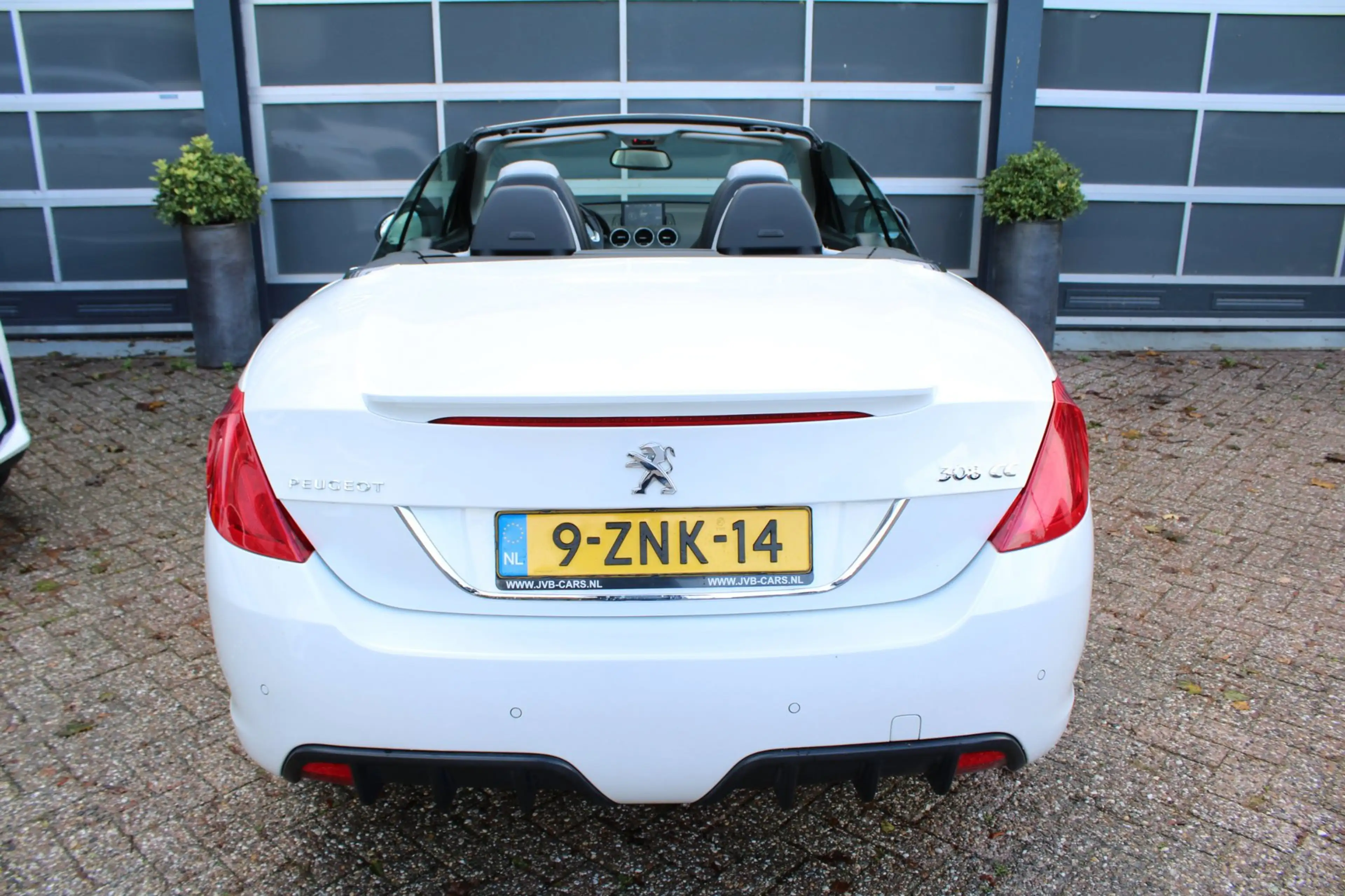 Peugeot 308 CC 1.6 THP Roland Garros — photo 11