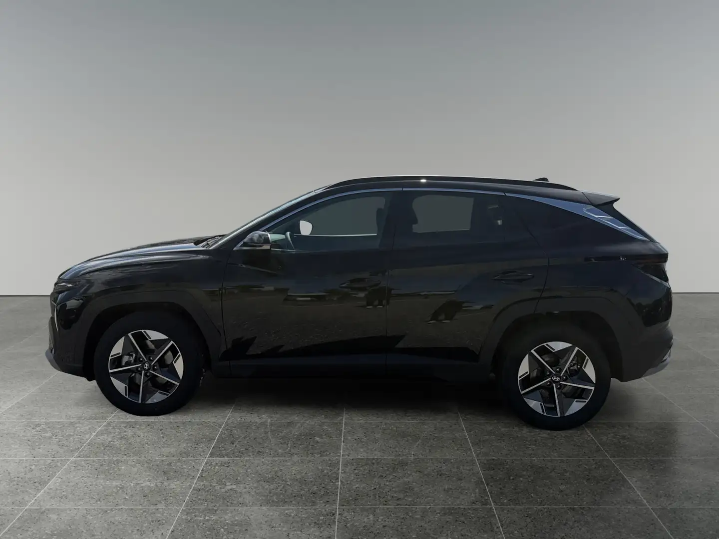Hyundai TUCSON NX4 Comfort Line 1,6 T-GDi HEV 4WD AT t7hc2 Schwarz - 2