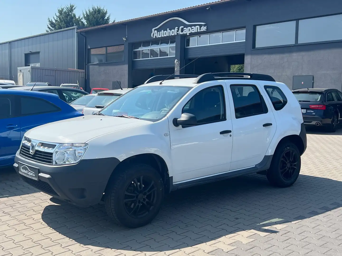 Dacia Duster Duster I 1.6 Ambiance 4x2/Klima/ZV/Eu5/TUV 06.27 Weiß - 1