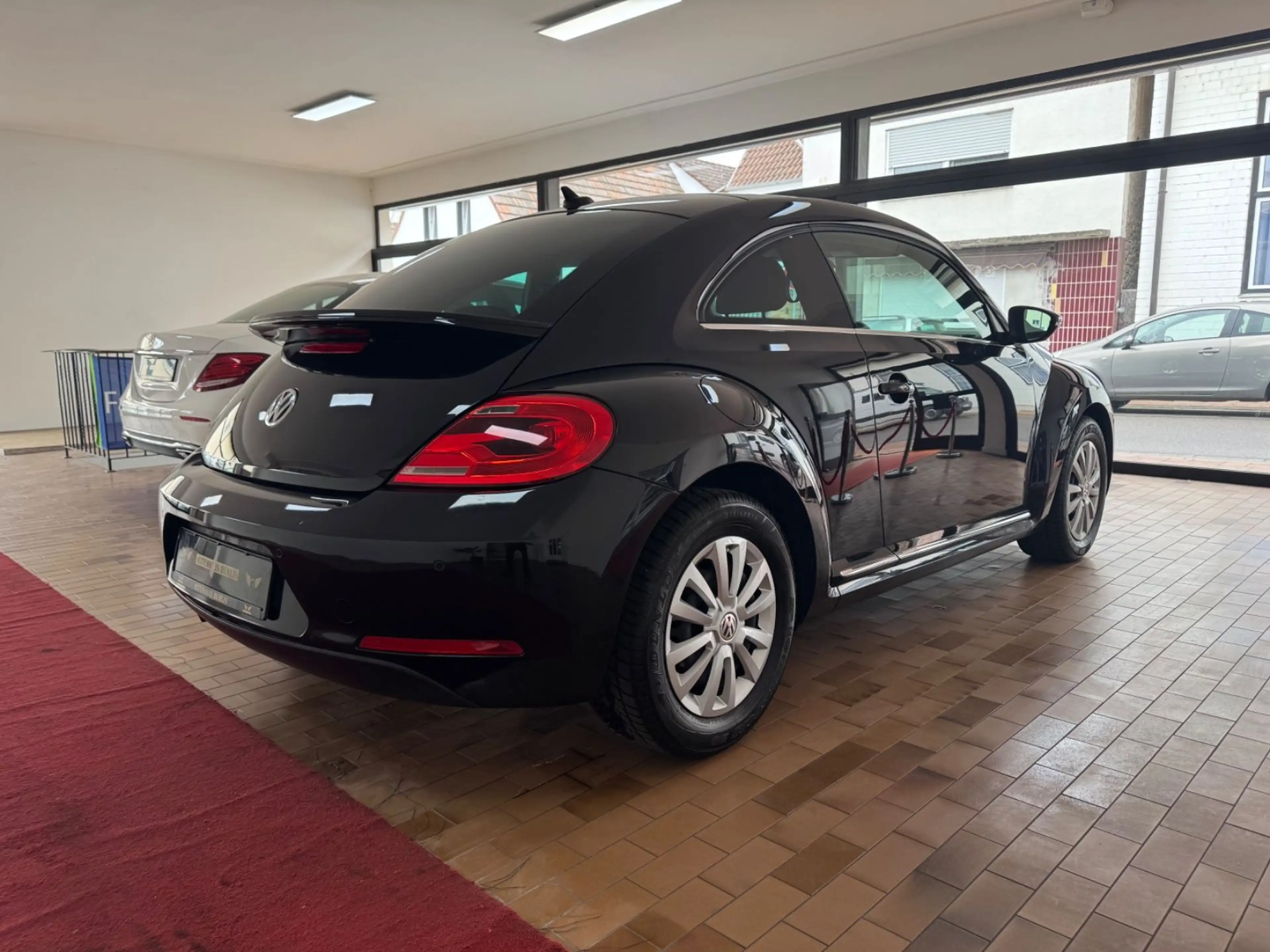 Volkswagen Beetle 1,4 Lim. Sport BMT/AUTMTK/2.HND/SCKHFT — photo 12