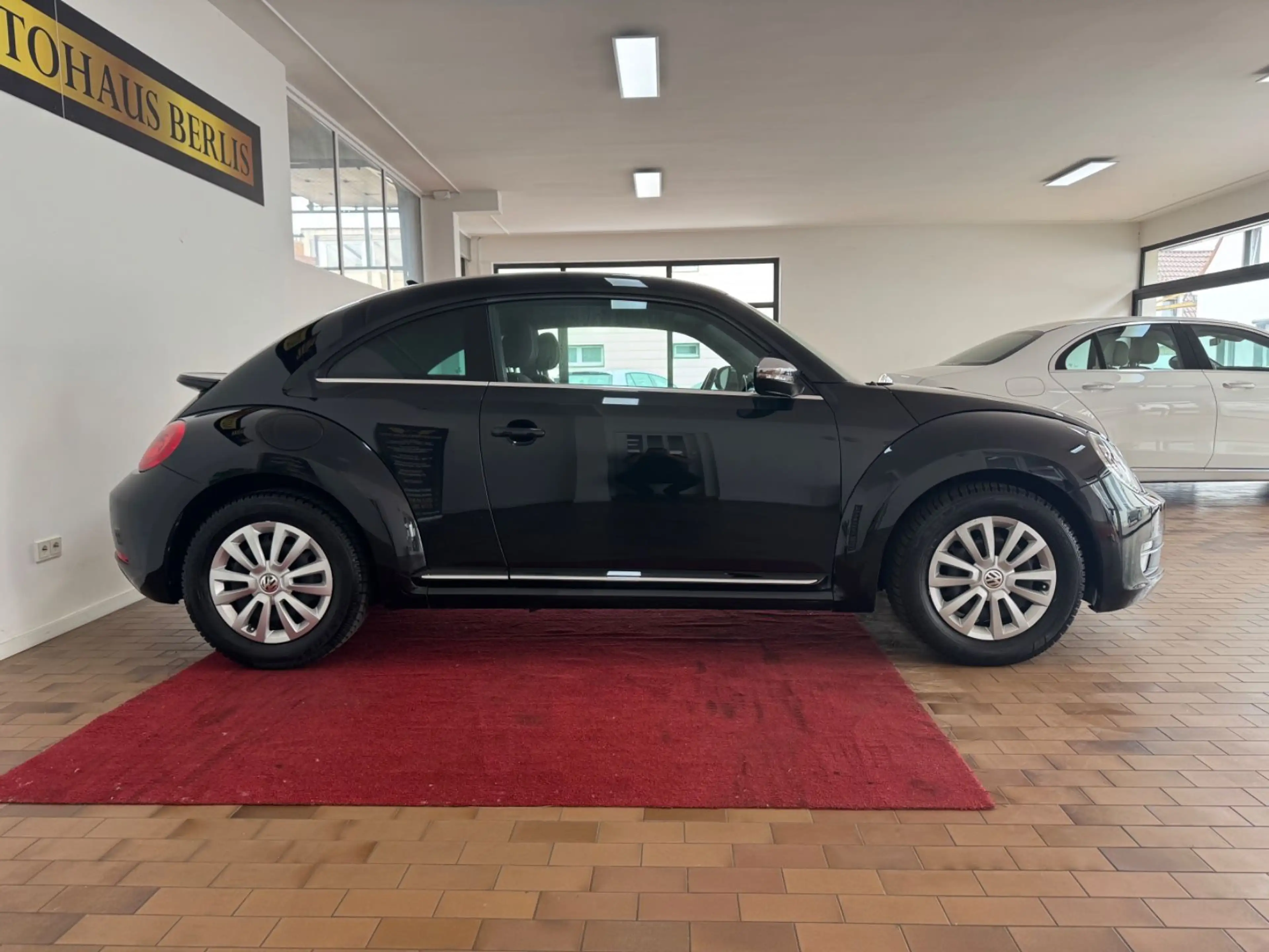 Volkswagen Beetle 1,4 Lim. Sport BMT/AUTMTK/2.HND/SCKHFT — photo 13