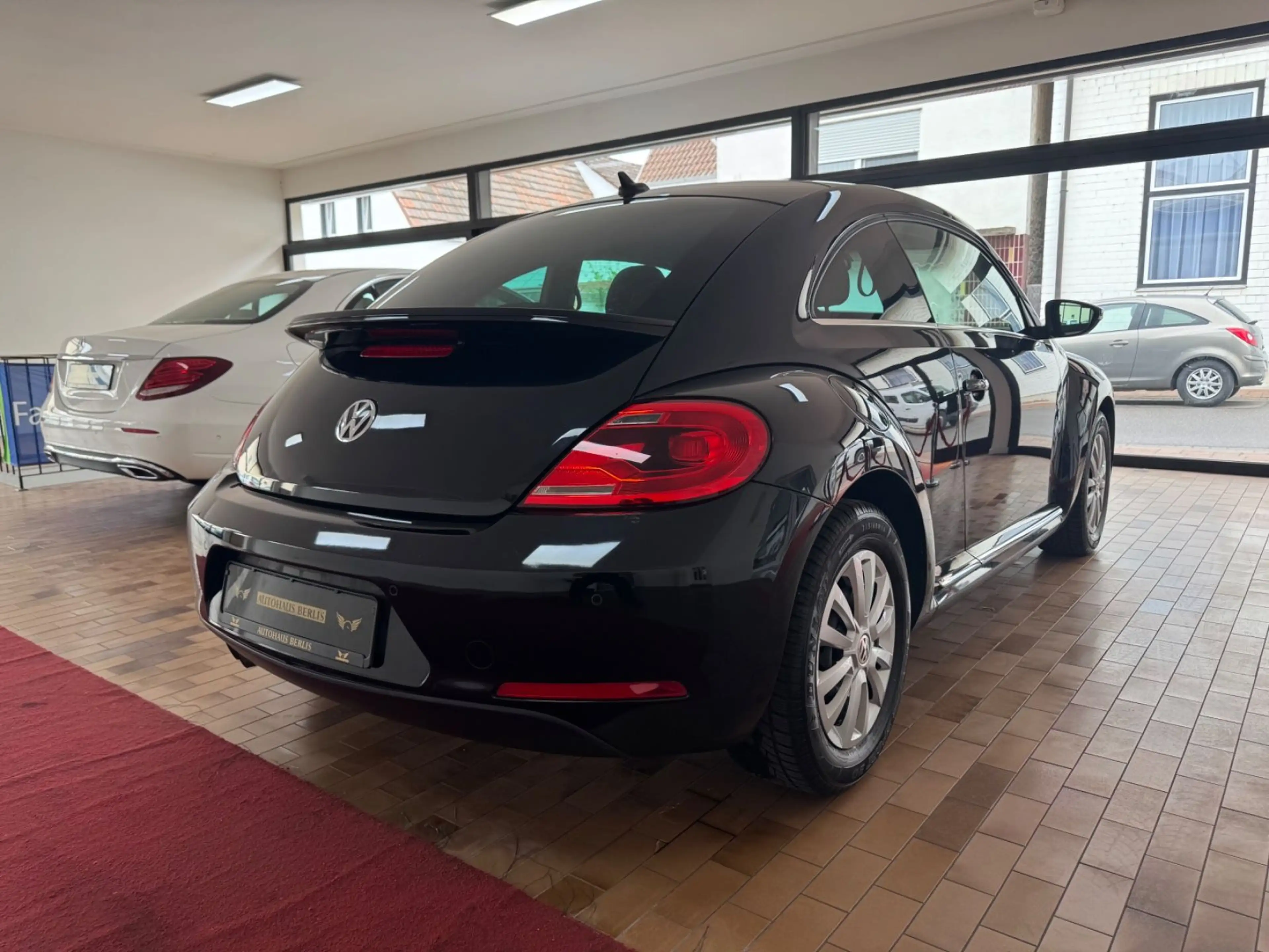 Volkswagen Beetle 1,4 Lim. Sport BMT/AUTMTK/2.HND/SCKHFT — photo 11