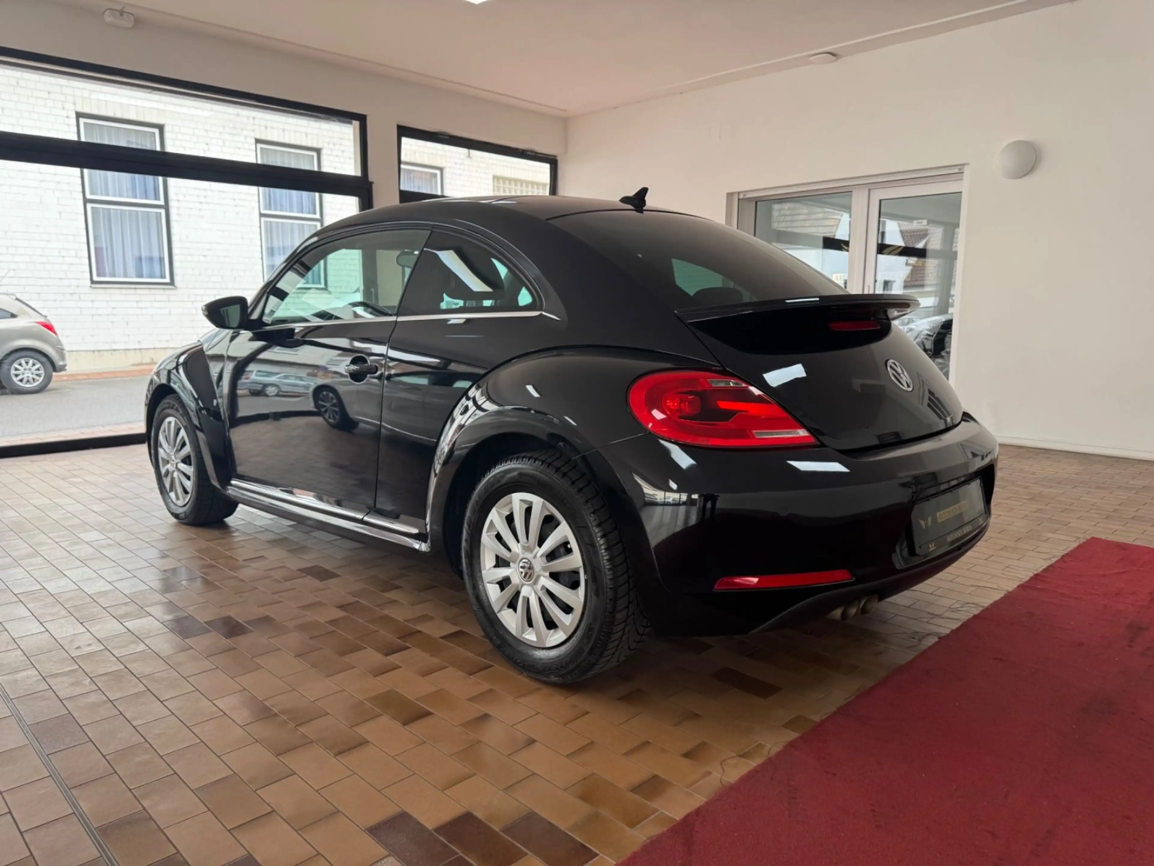 Volkswagen Beetle 1,4 Lim. Sport BMT/AUTMTK/2.HND/SCKHFT — photo 9